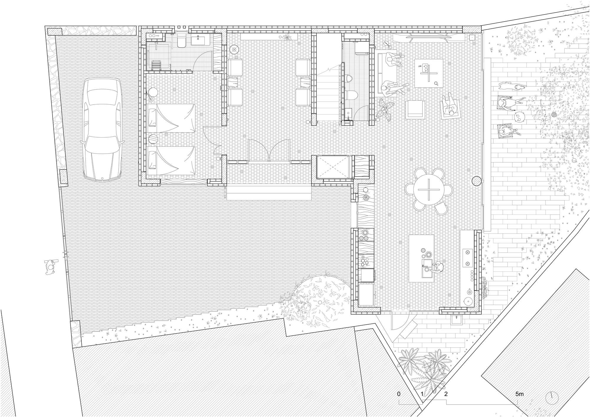 Ground floor plan drawing showing garage, living areas, courtyard, and planted garden zones