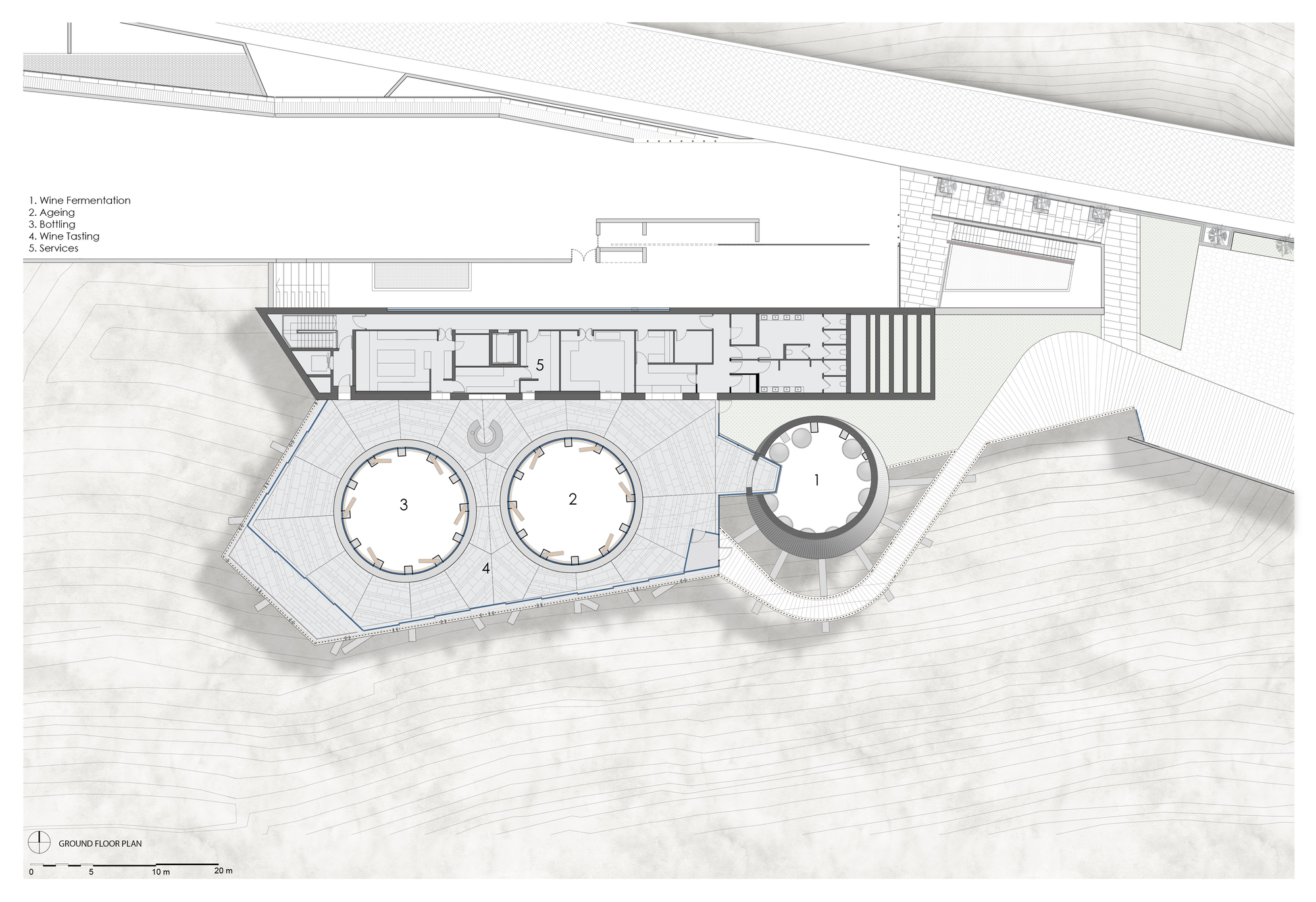 Ground floor plan drawing showing three circular volumes connected to linear service wing and entrance plaza