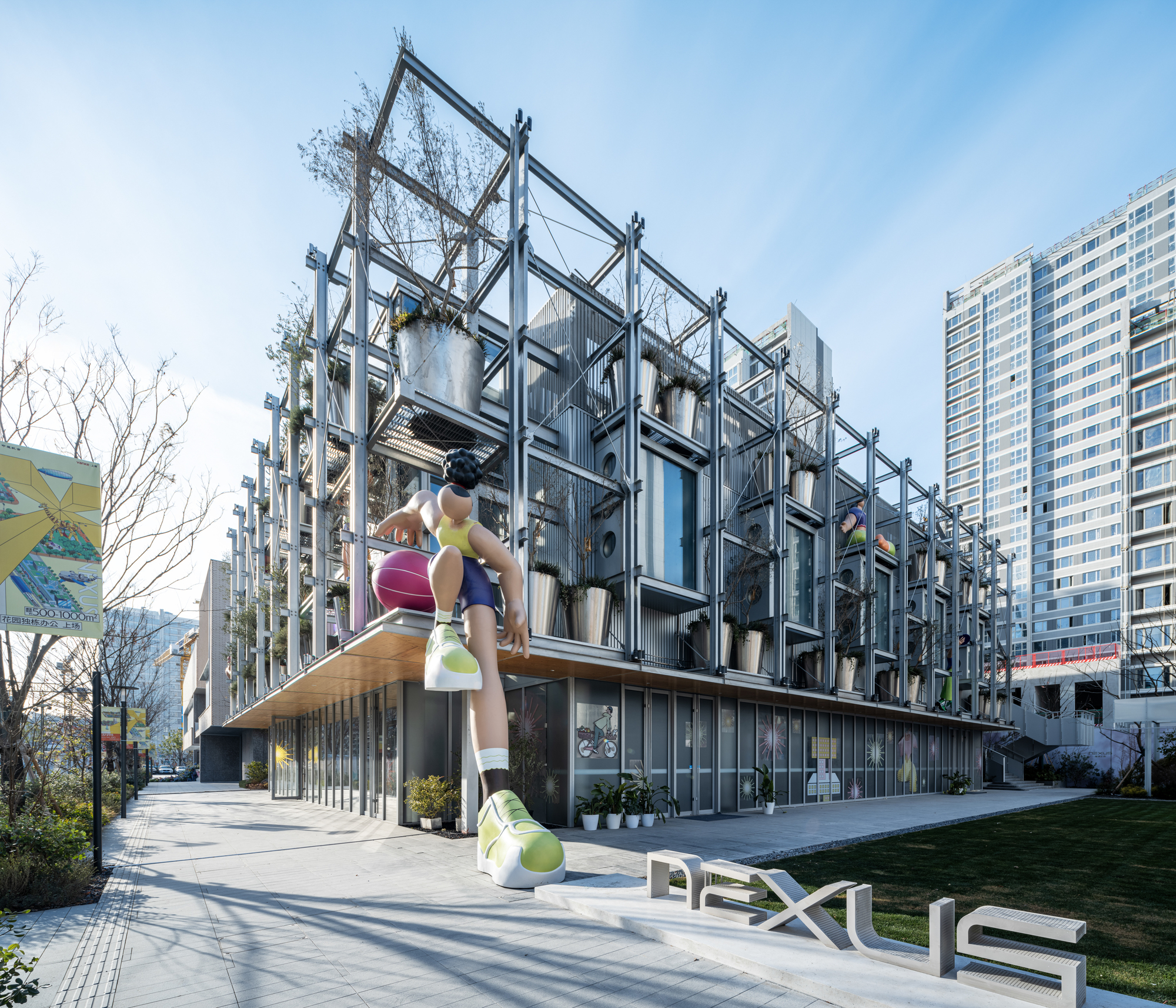 Steel exoskeleton facade with climbing figure sculpture and planted modules above a glazed ground floor