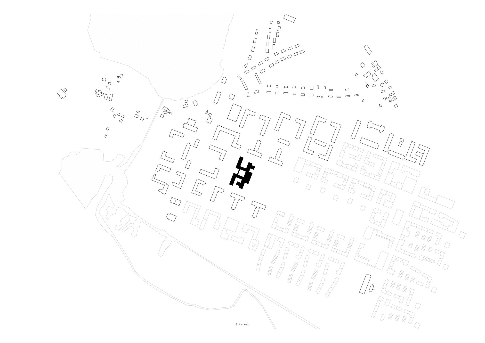 Site plan drawing showing building footprint highlighted in black within surrounding street grid