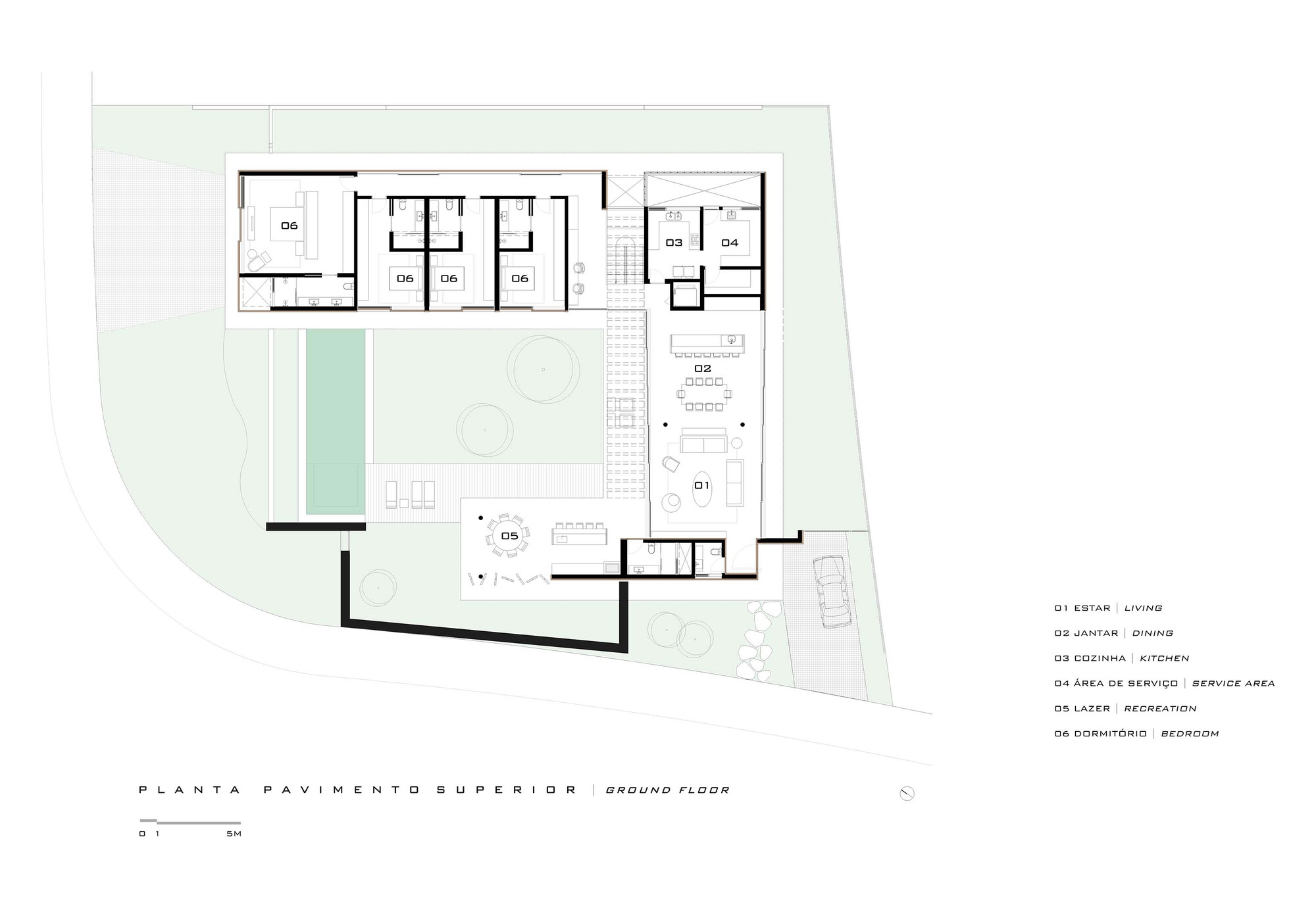 Ground floor plan drawing showing living, dining, kitchen, and bedroom spaces around central courtyard