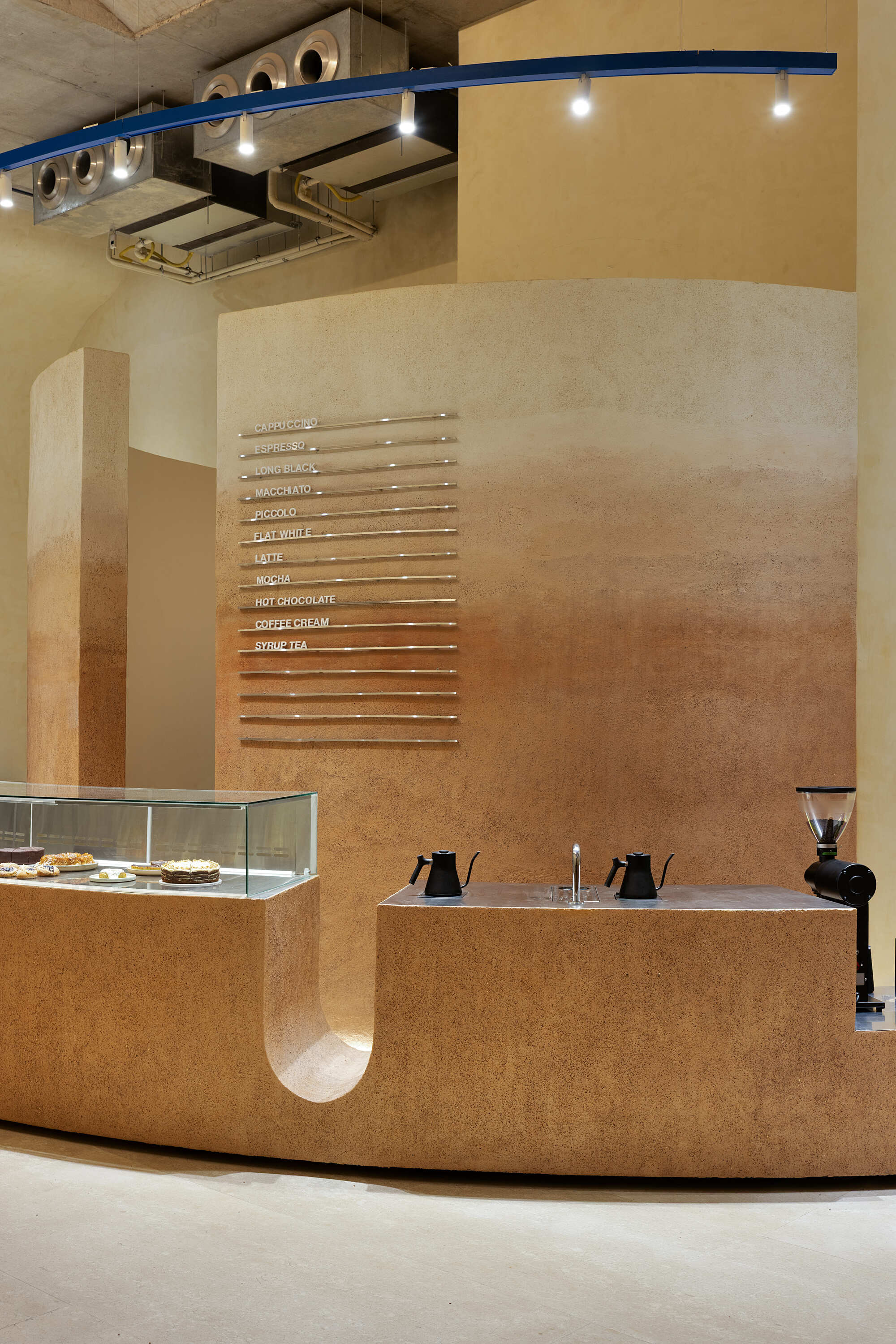 Cork counter detail with horizontal menu slots and circular portal opening at base