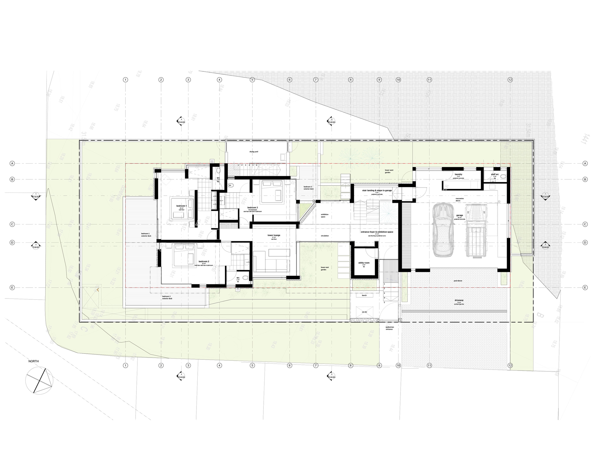 Ground floor plan showing living spaces, central staircase, and garage at right edge