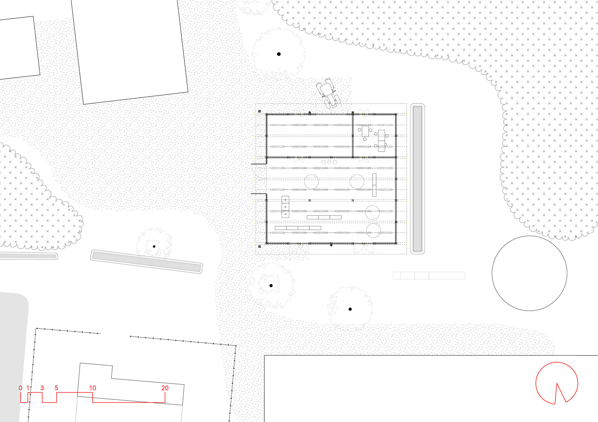 Site plan drawing showing the building footprint with surrounding landscape and adjacent structures