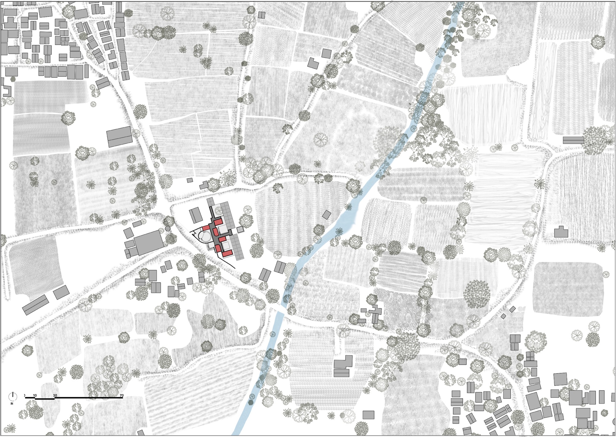 Site plan drawing showing the building footprint among agricultural plots, roads, and scattered vegetation in the landscape