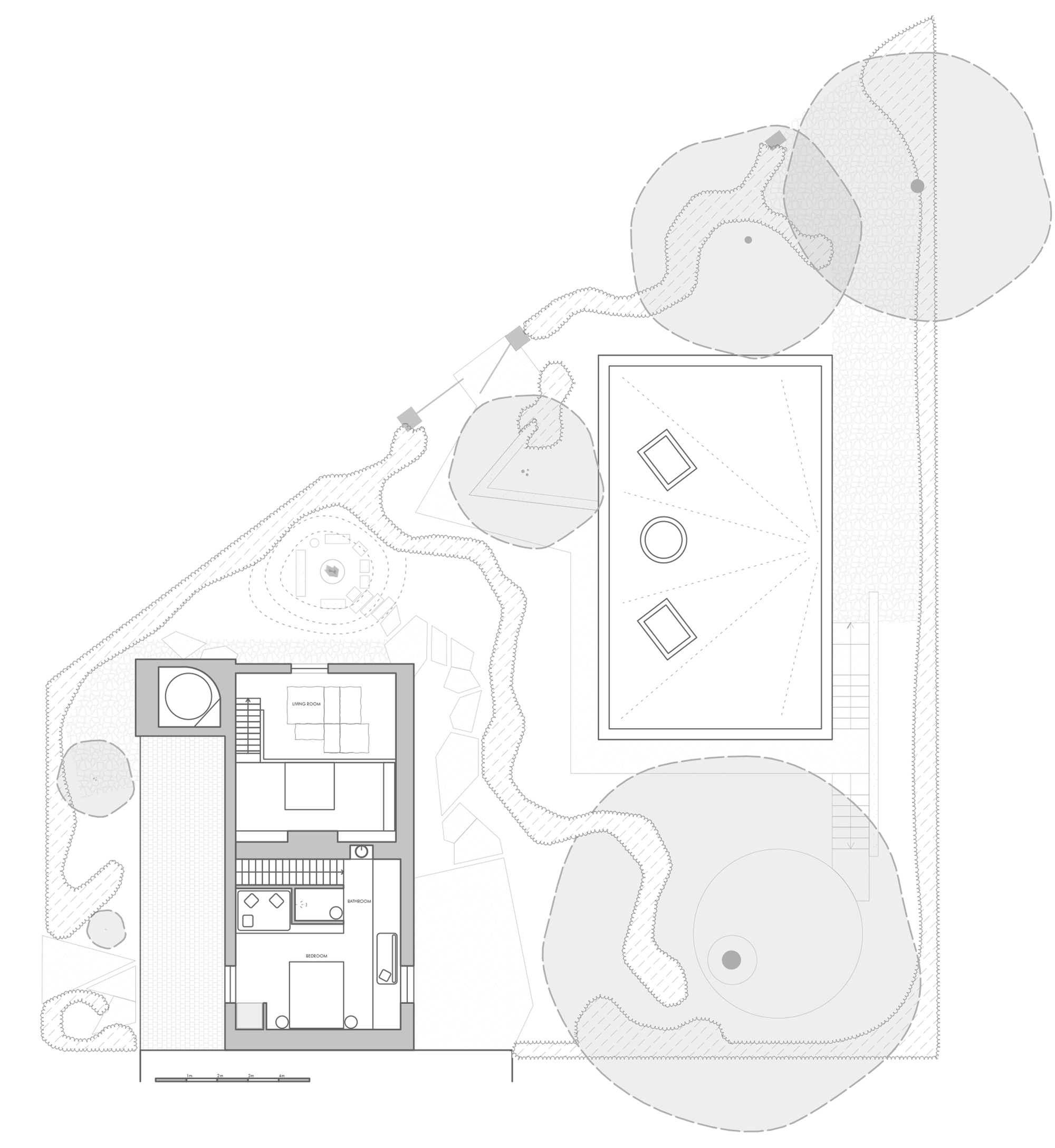 Floor plan drawing showing two rectangular structures with interior partitions surrounded by landscaped terrain with contour lines