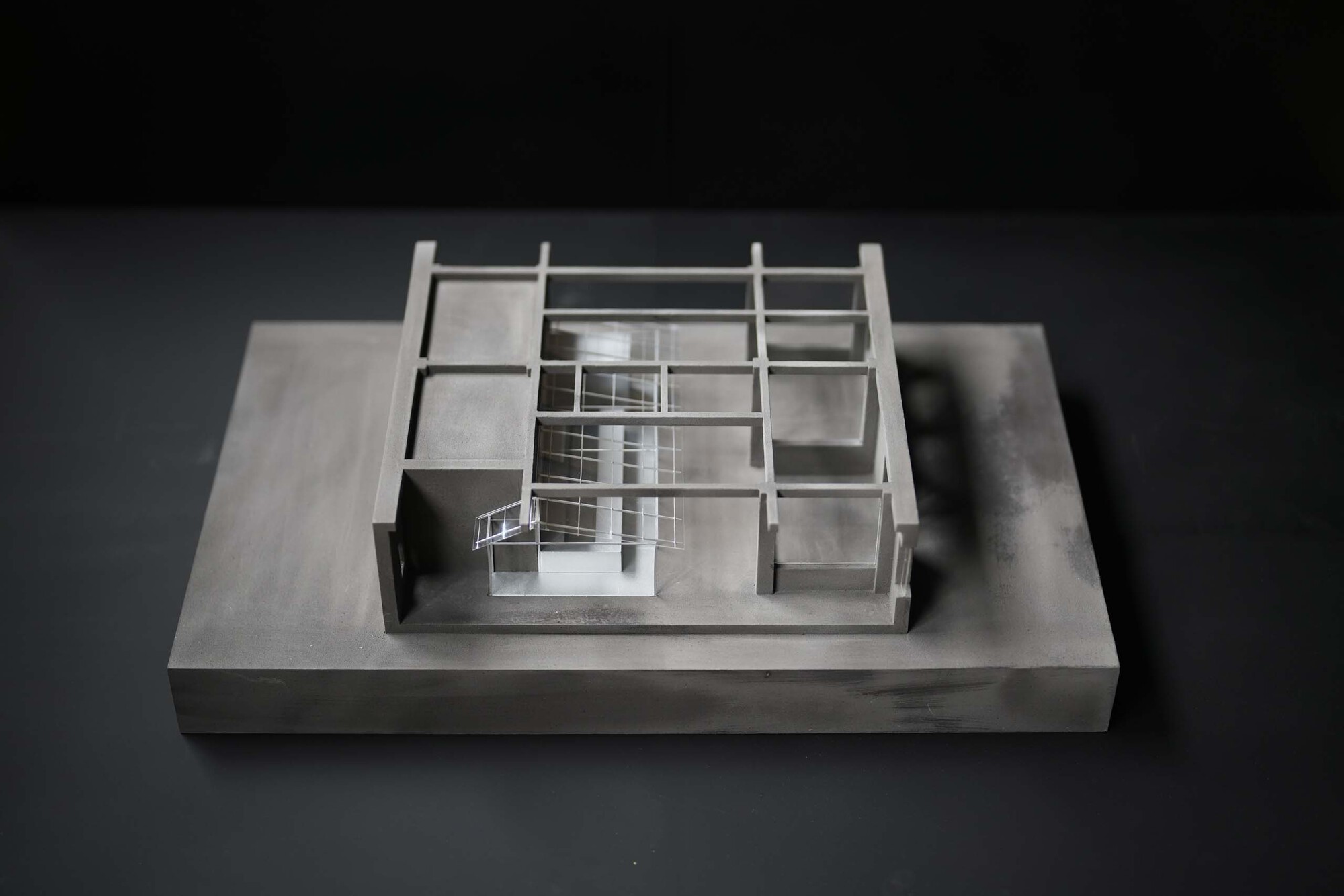 Physical model viewed from above revealing the spatial divisions and central staircase arrangement