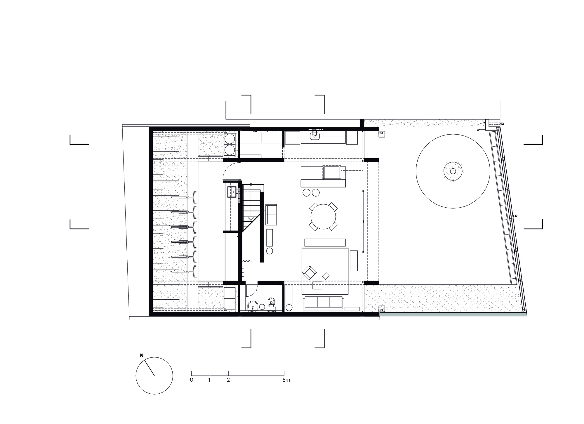 Ground floor plan showing living area with central stair and exterior terrace with circular pool