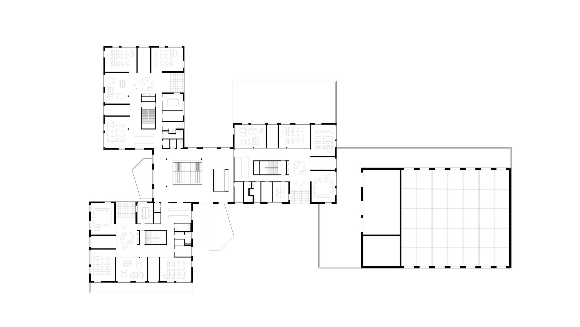 The image presents a detailed floor plan of a modern building, showcasing a complex arrangement of rooms, corridors, and staircases. The design emphasizes geome