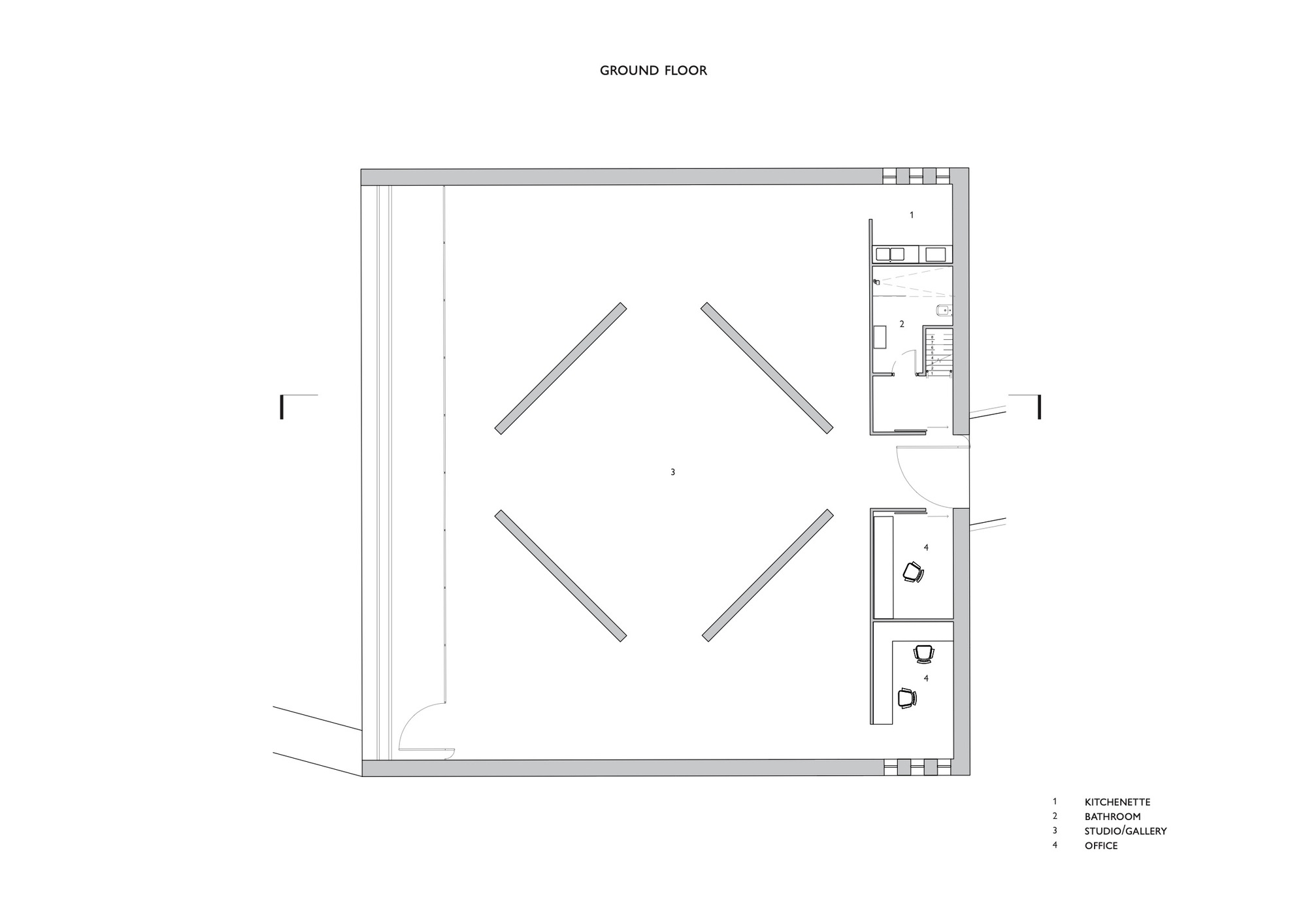 Ground floor plan with central diamond arrangement of slanted elements and service spaces to one side