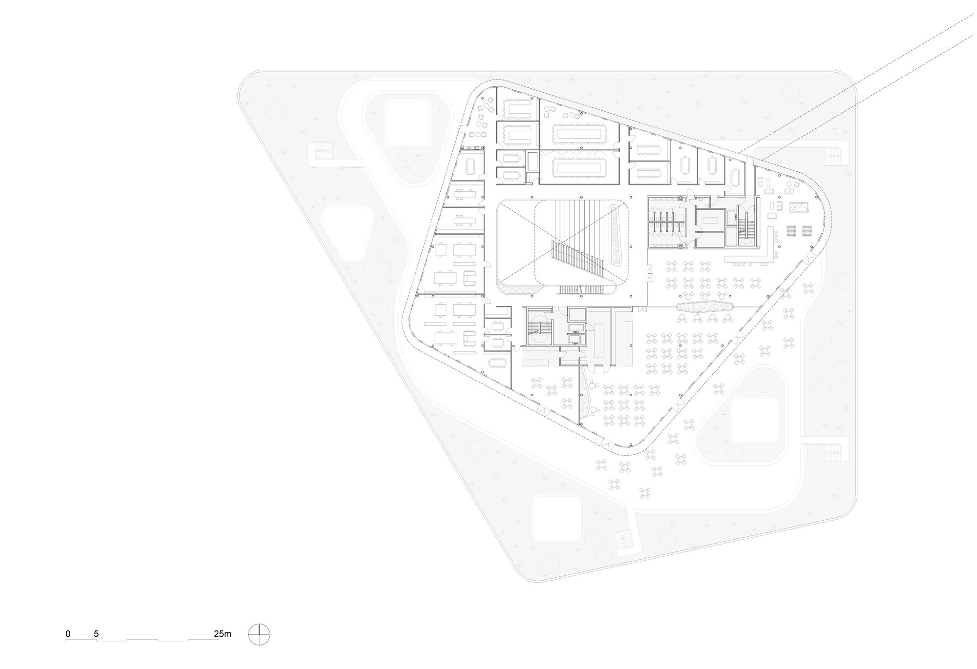 Floor plan drawing showing triangular perimeter with interior rooms and central atrium space