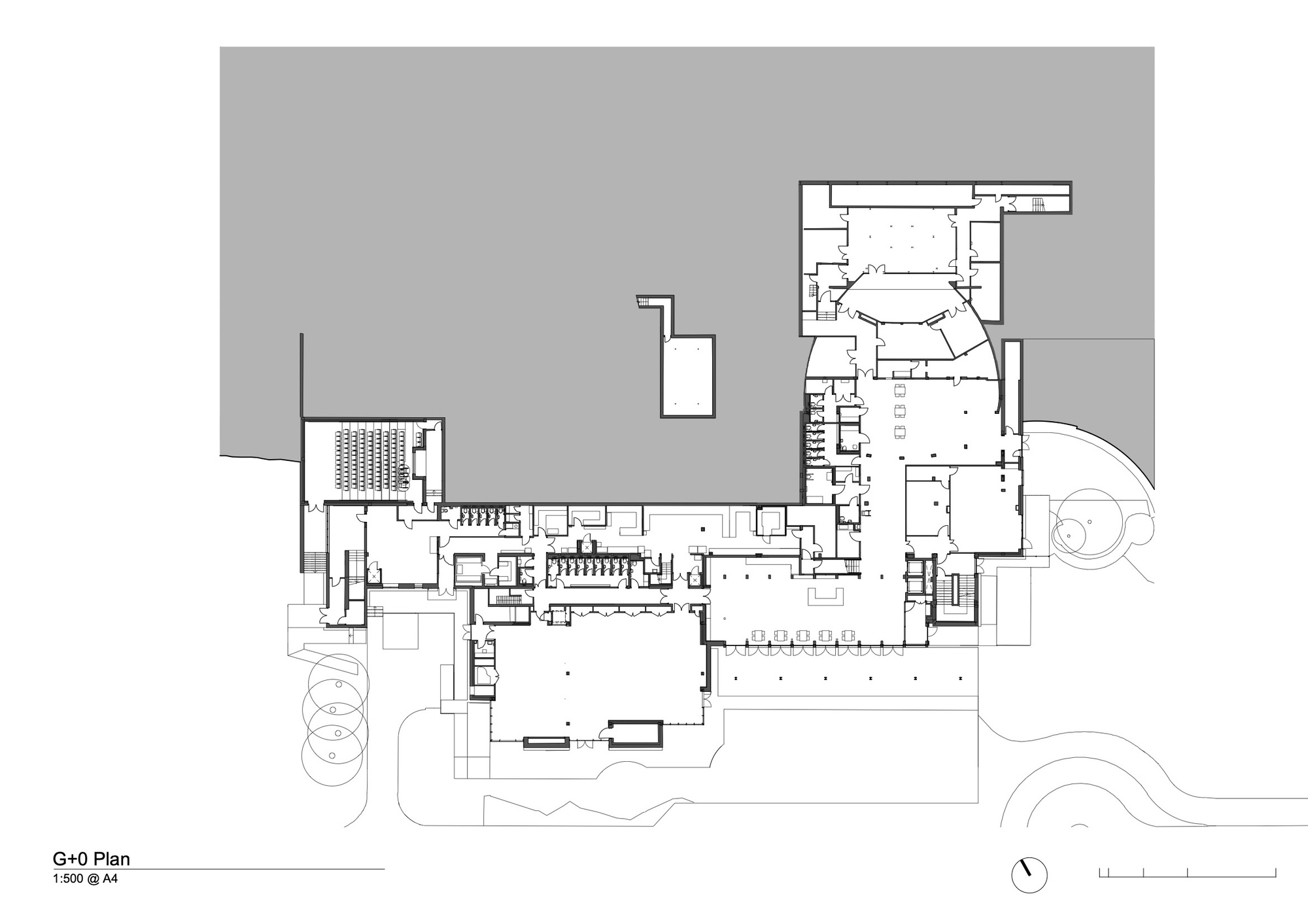 Ground floor plan drawing revealing detailed interior layout with auditorium and support spaces