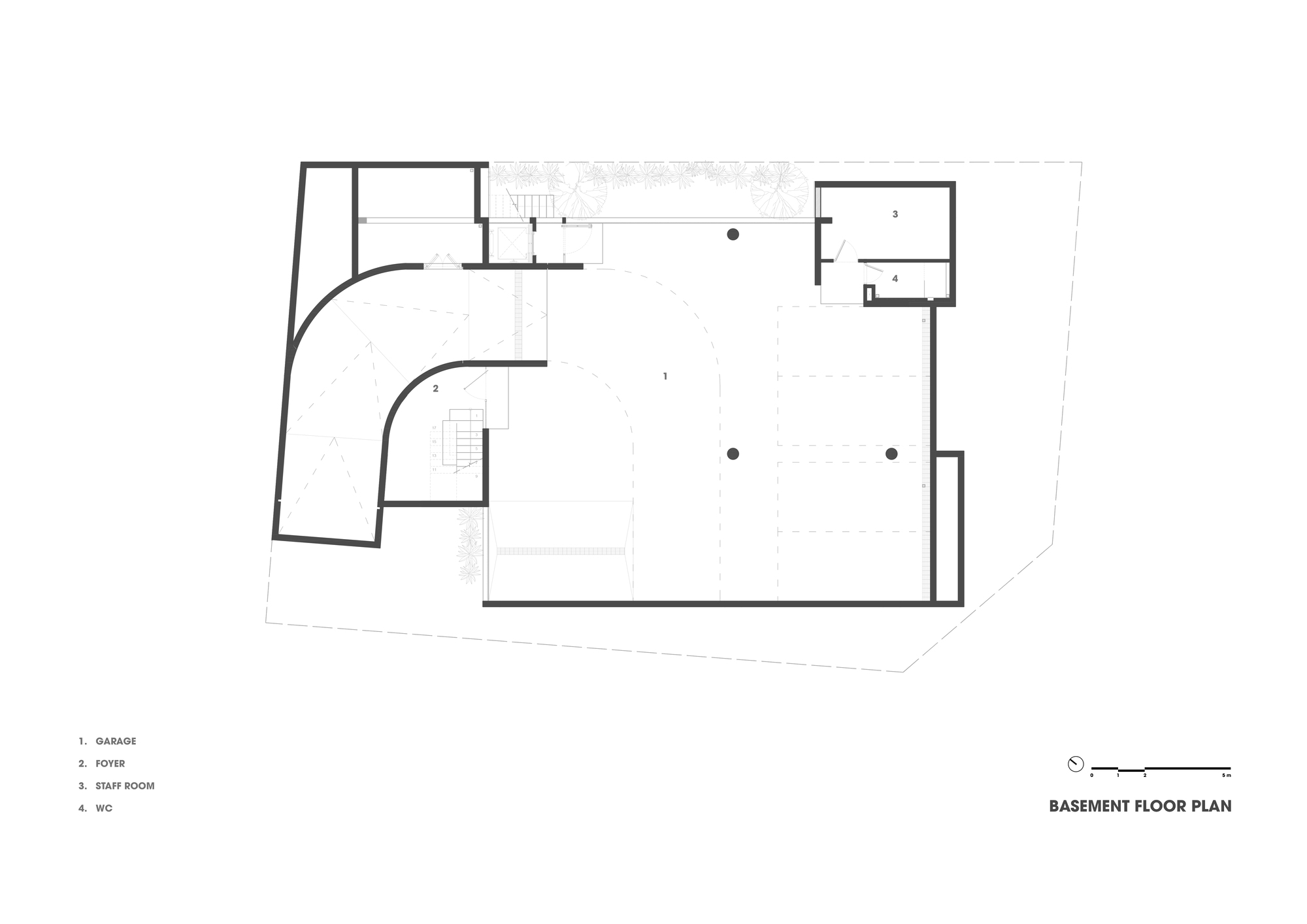 Basement floor plan drawing with curved exterior wall and central staircase serving garage and storage spaces
