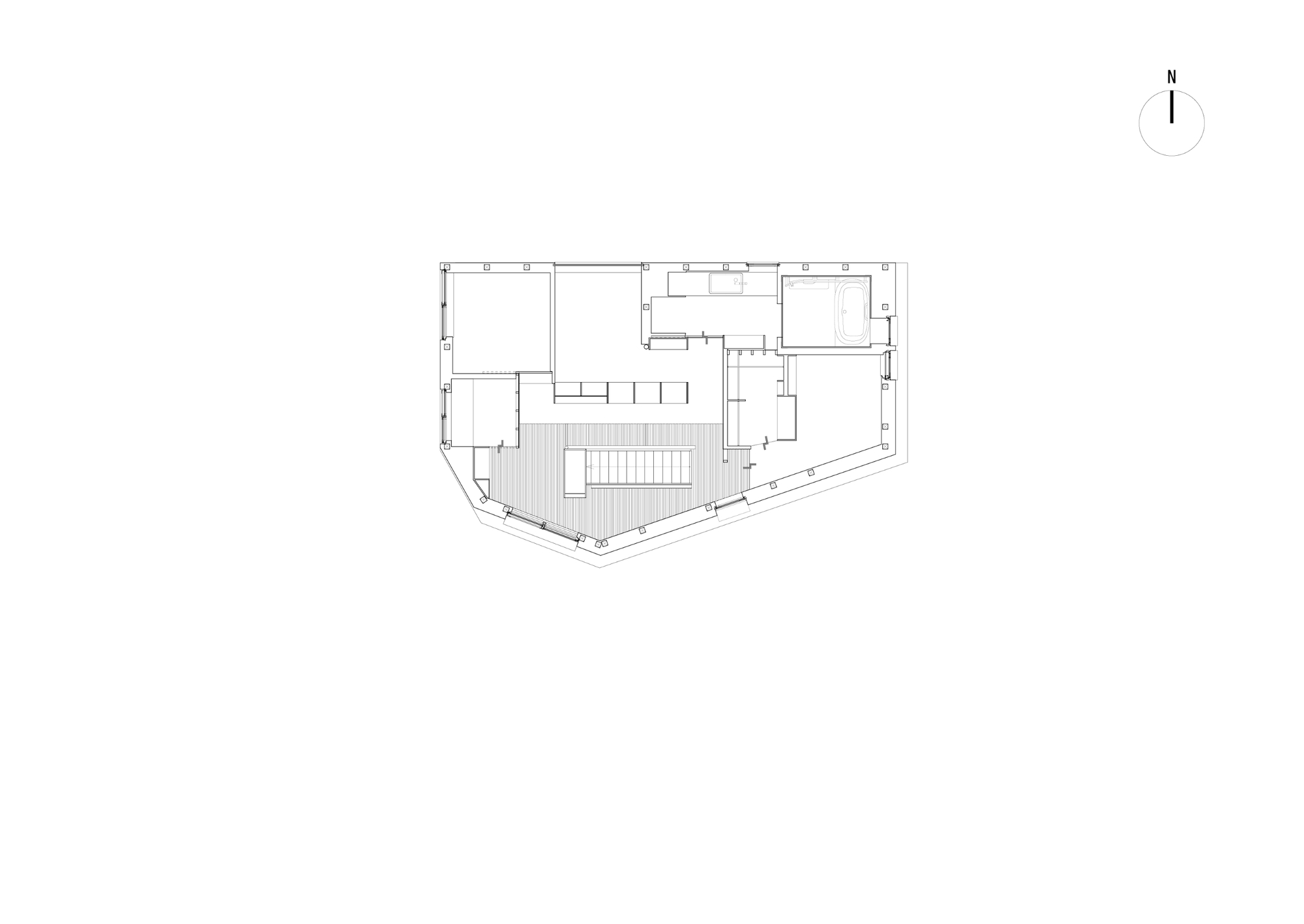 Floor plan drawing showing irregular trapezoidal site with central stair and surrounding rooms