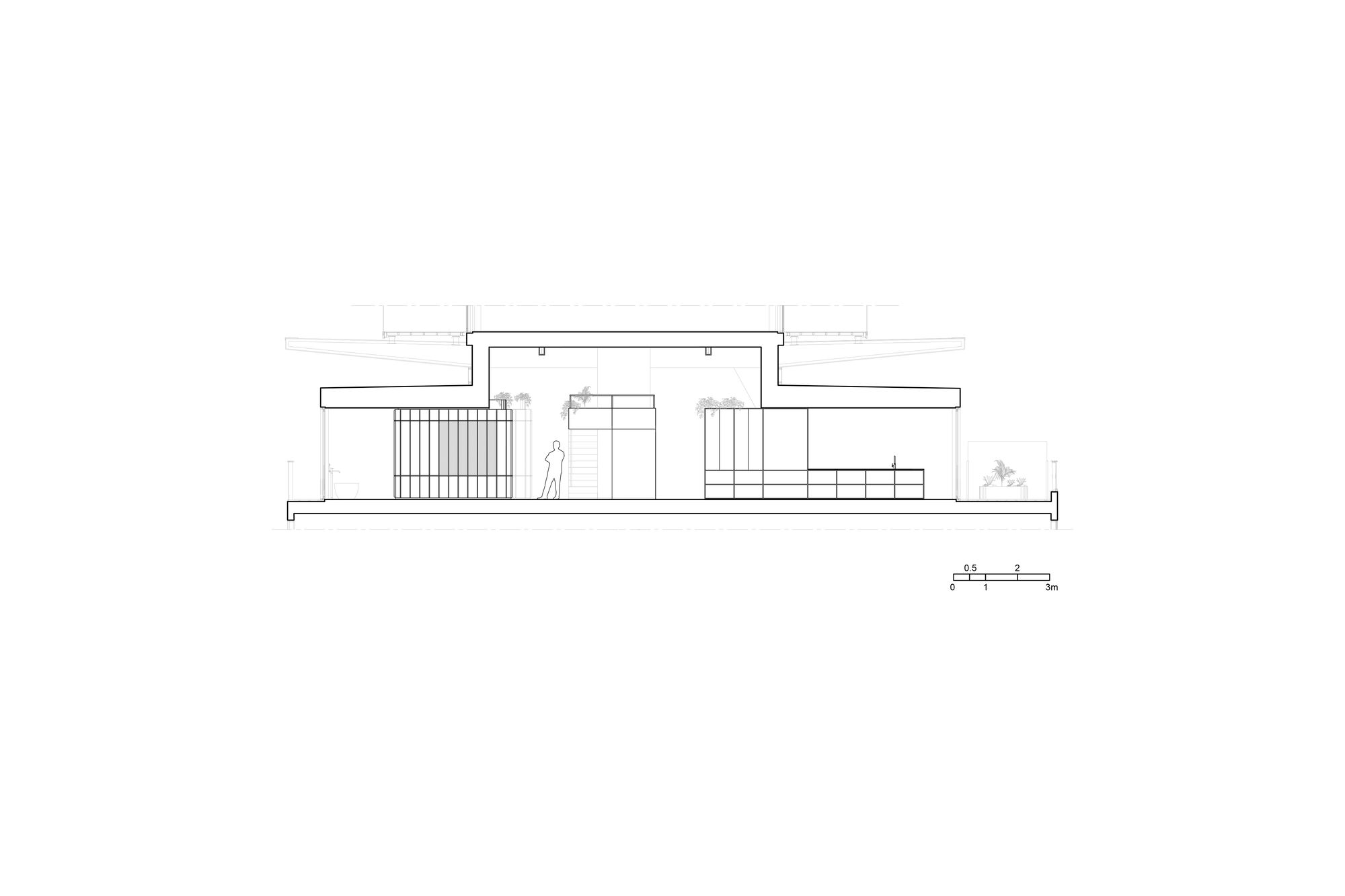 Section drawing revealing interior volumes beneath a cantilevered roof with a figure for scale