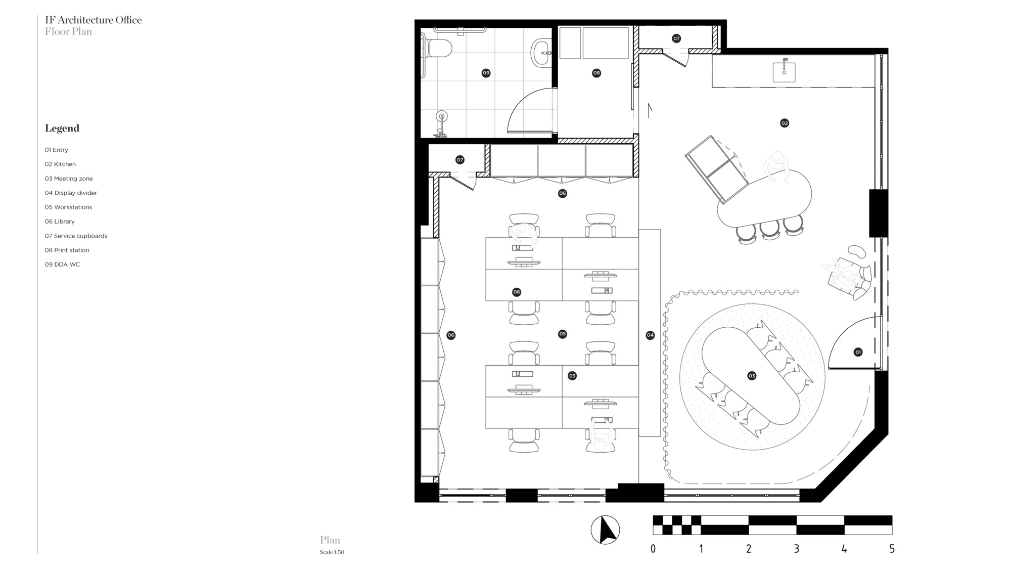 Floor plan drawing showing workstations, bathroom facilities, and circular meeting table in open office layout