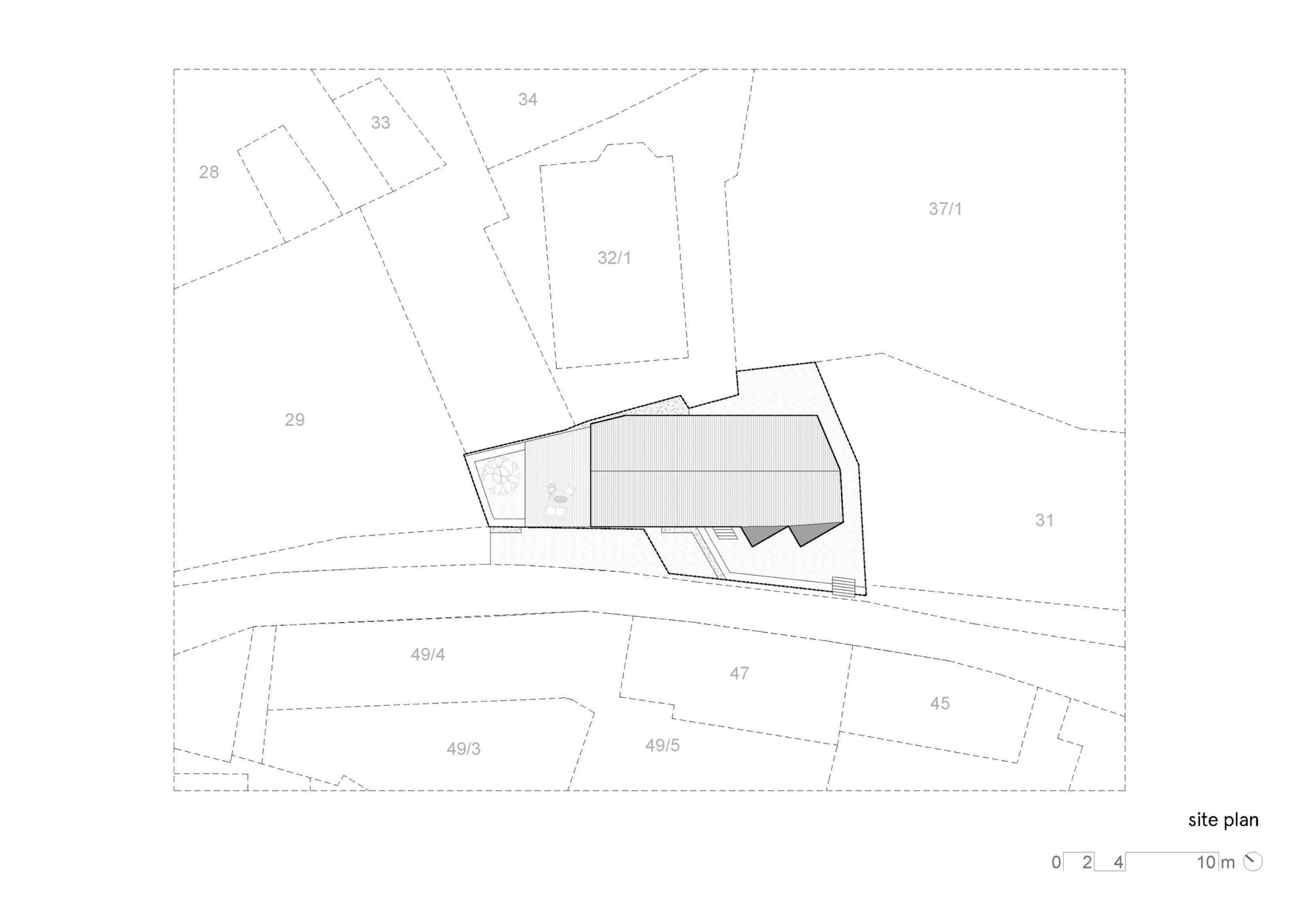 Site plan drawing showing the angled footprint within the surrounding parcels