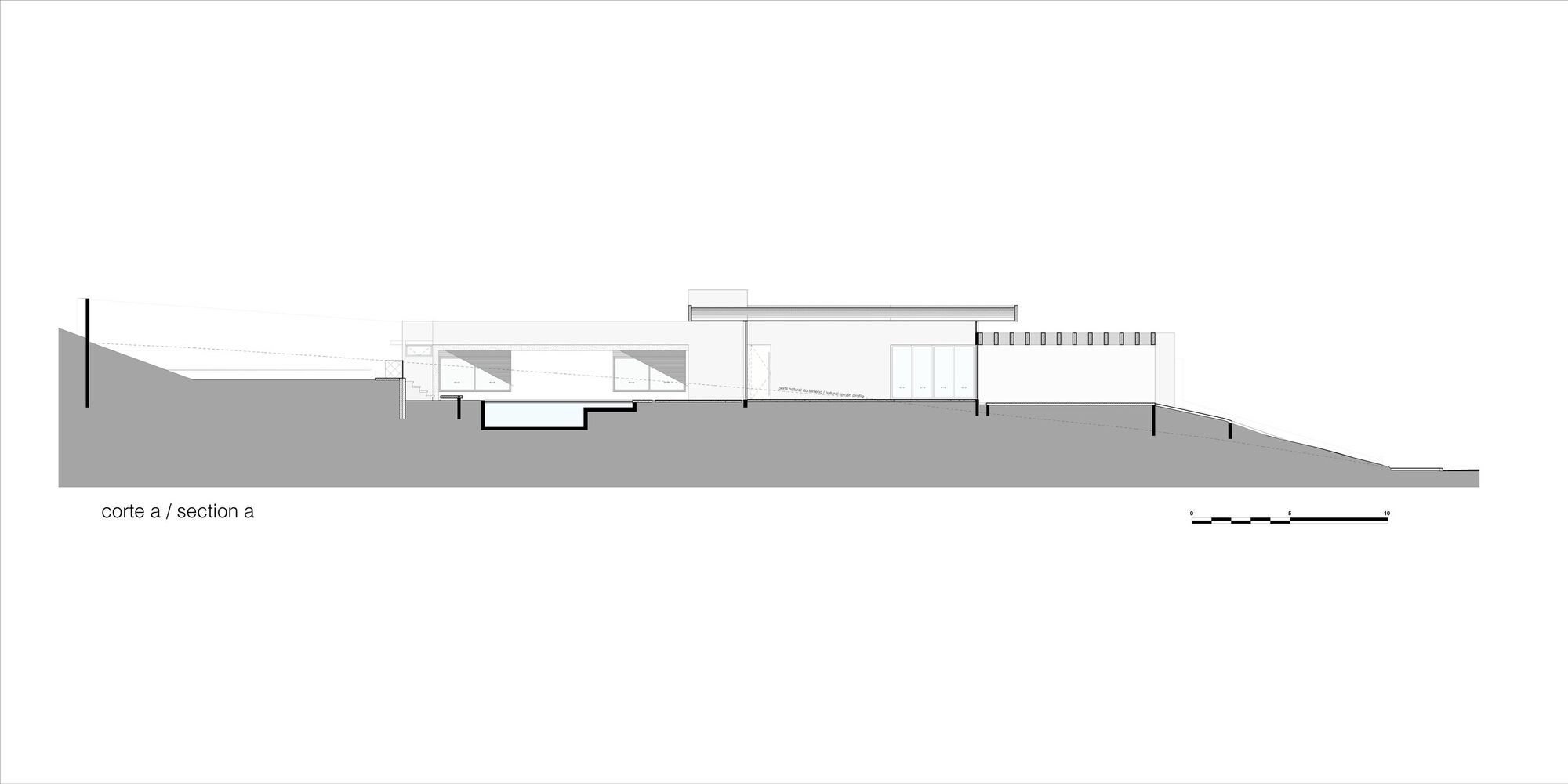 Section drawing showing the building profile sitting on a sloping site