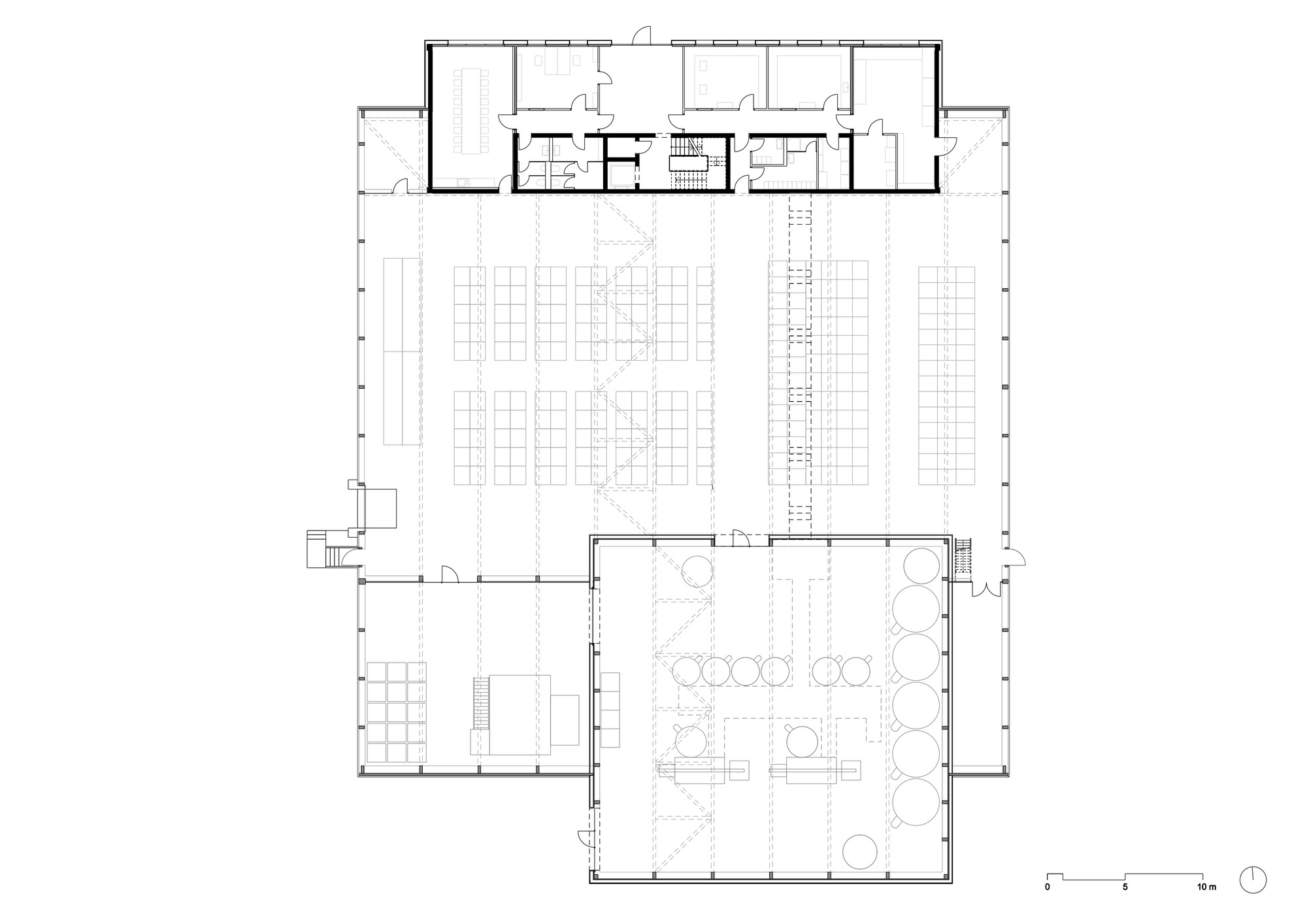 Ground floor plan drawing indicating large hall with seating rows and service rooms along the perimeter