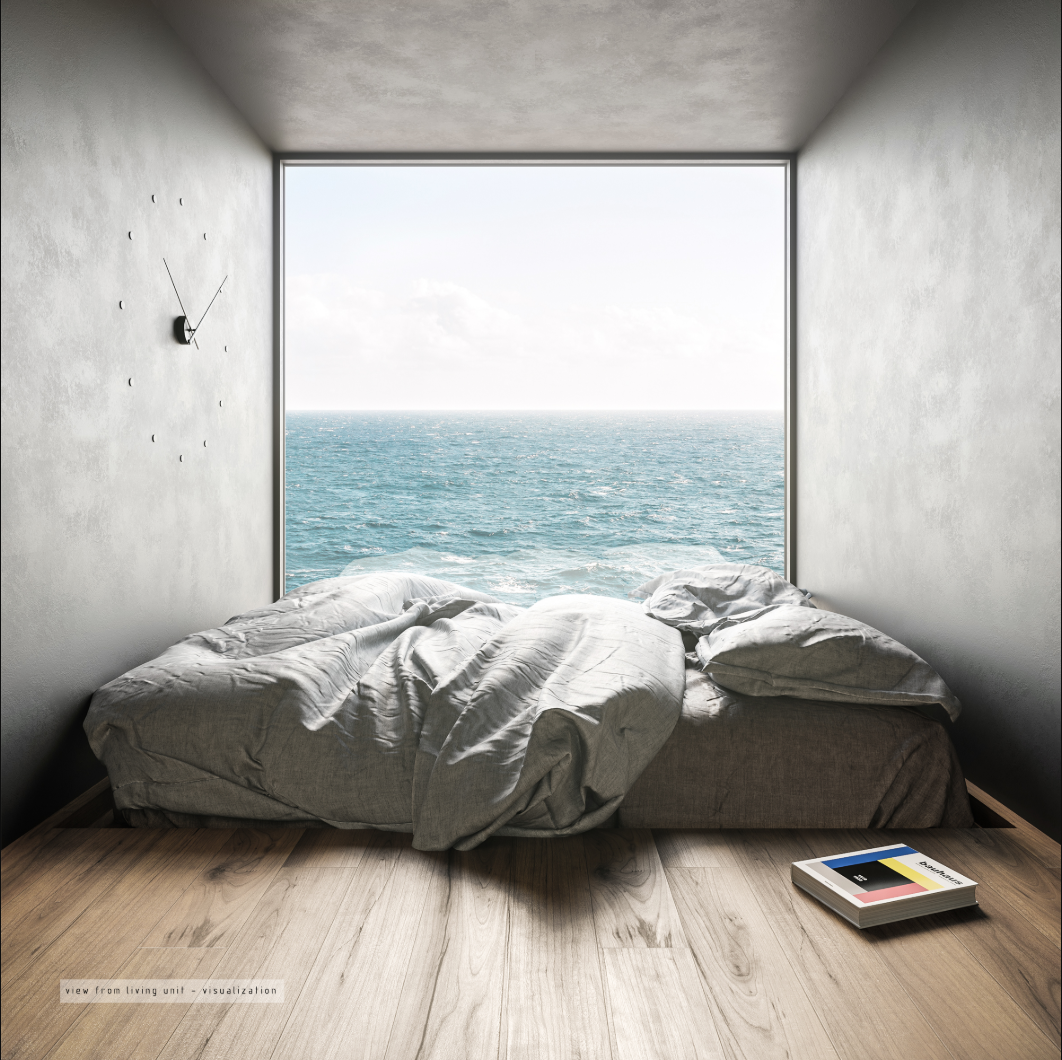 Minimal living unit framing uninterrupted panoramic ocean views from the offshore residential capsule.