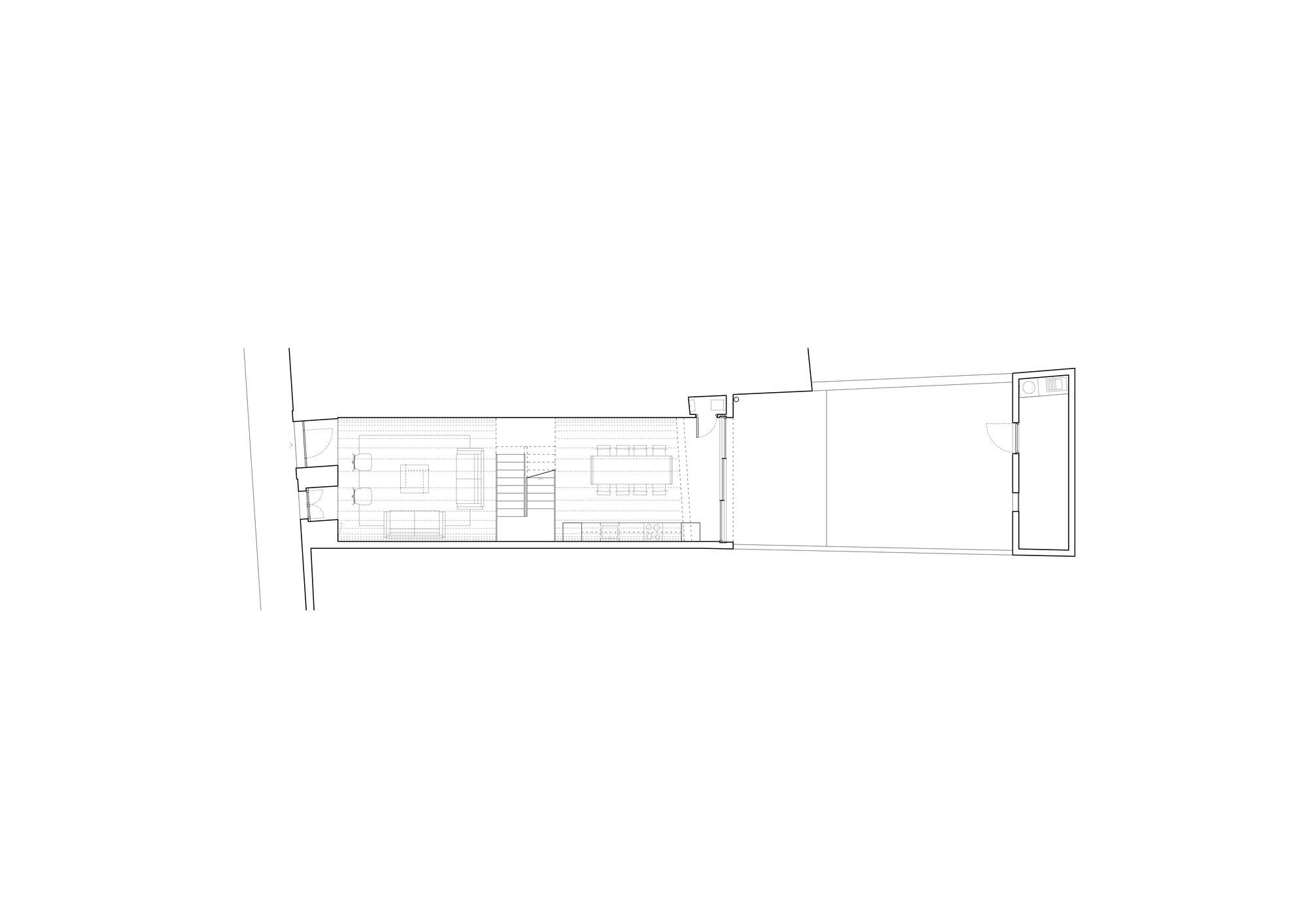 Ground floor plan drawing showing living and dining zones with central stair and courtyard
