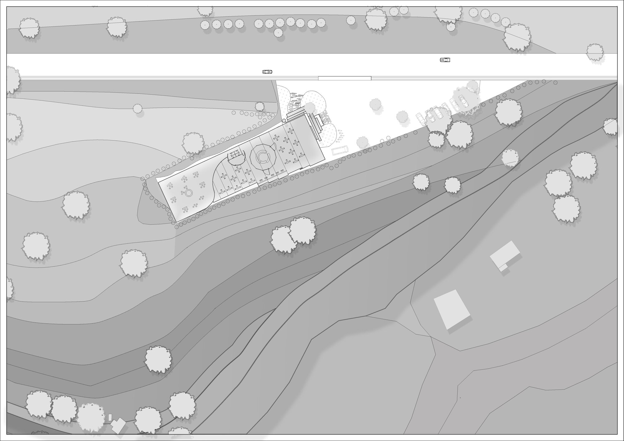 Site plan drawing showing the elongated structure nestled within contoured terrain and scattered tree canopies
