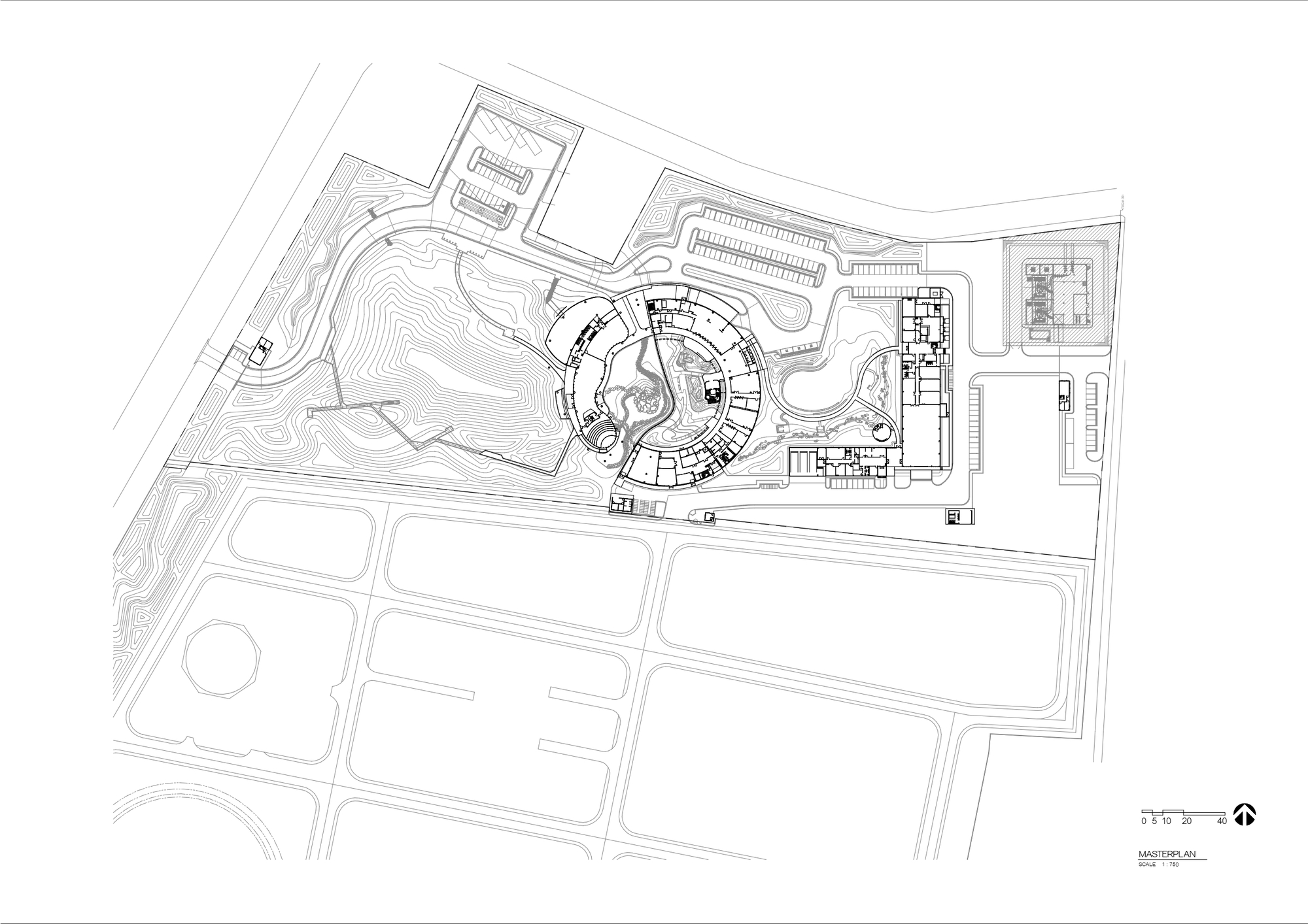Site plan drawing showing a circular building with radiating wings set within a landscape with topographic contours