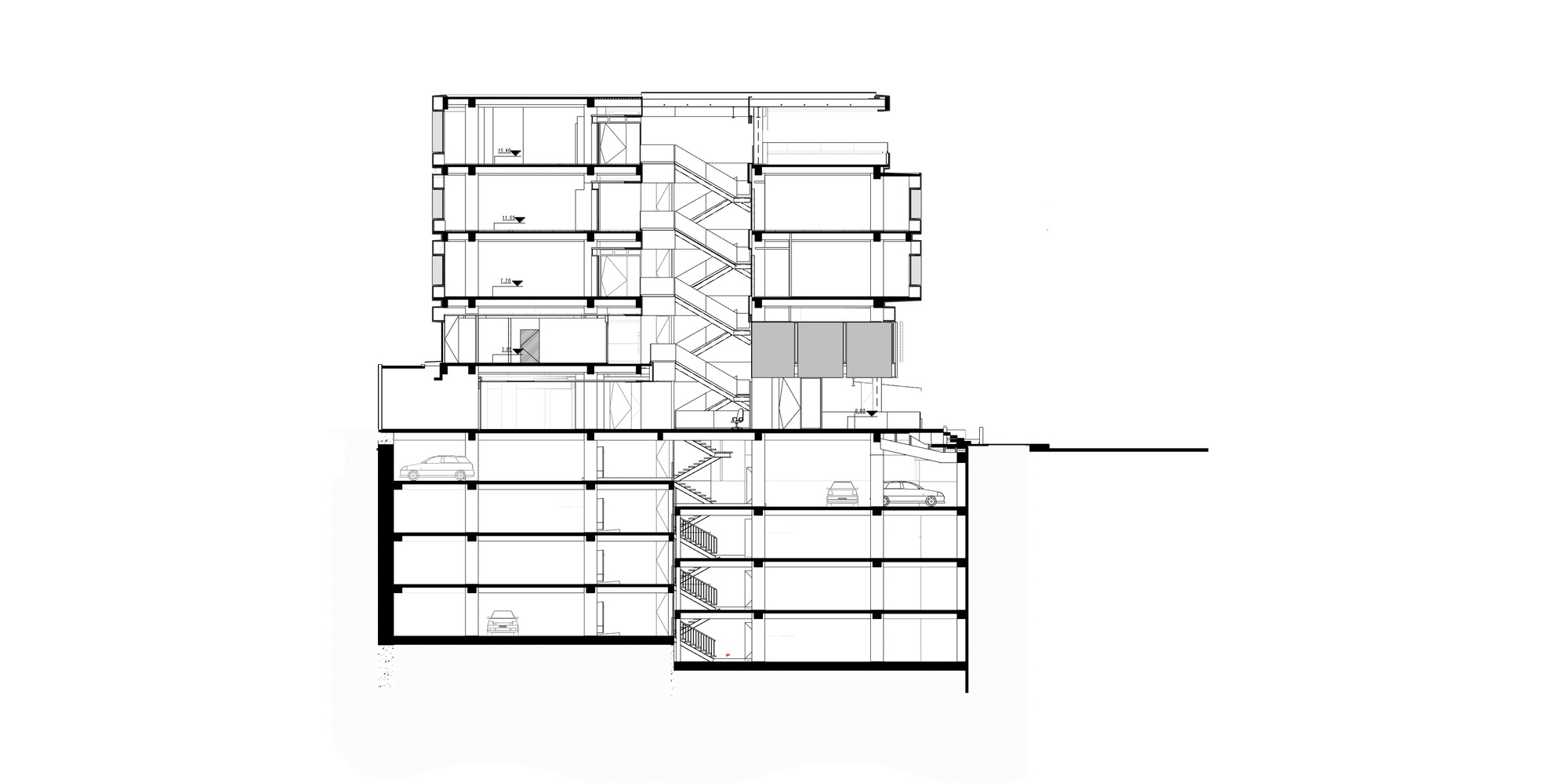 Section drawing revealing a diagonal staircase connecting multiple floor levels in an angular building
