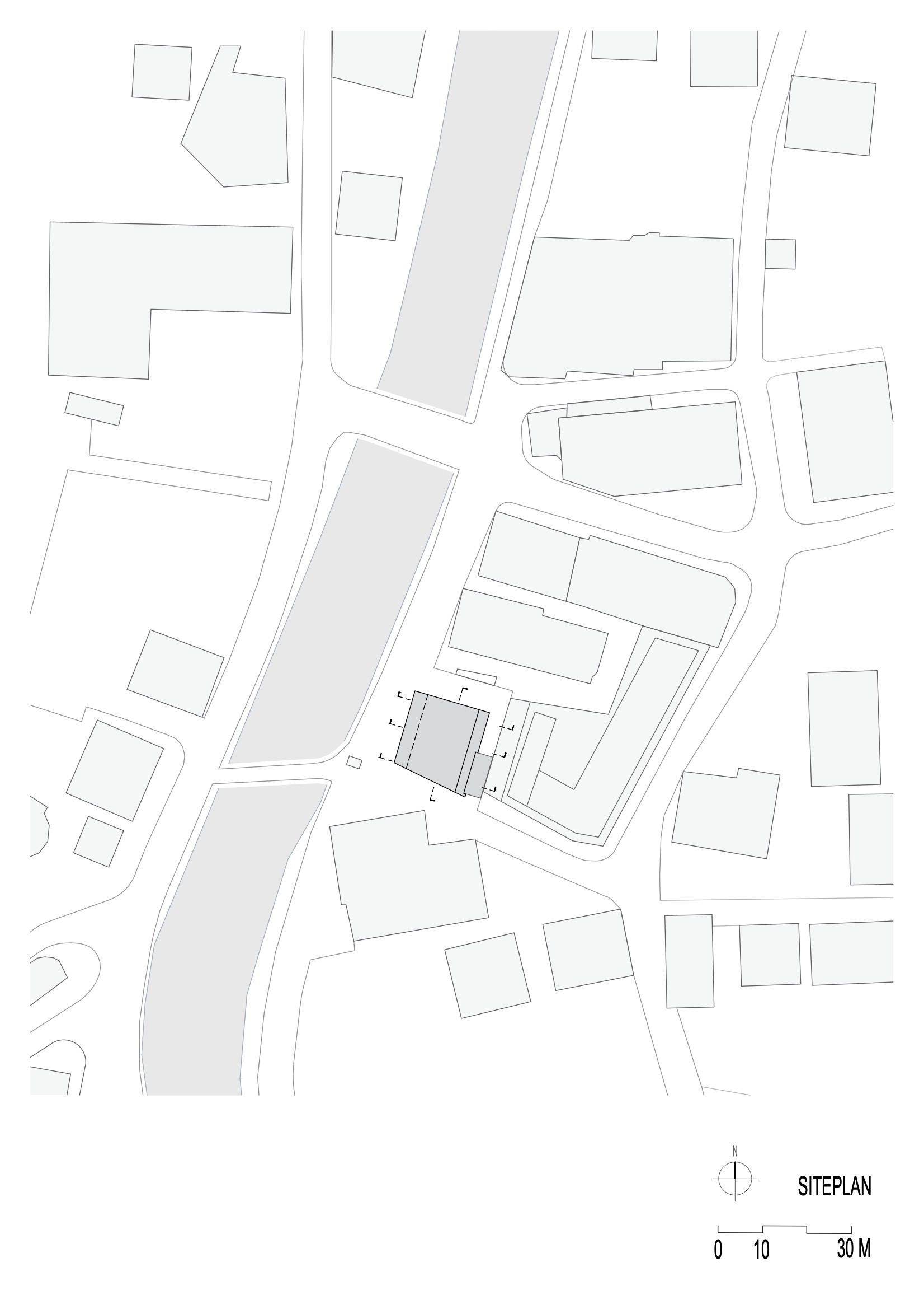 Site plan drawing showing building footprint and street layout in the surrounding urban context