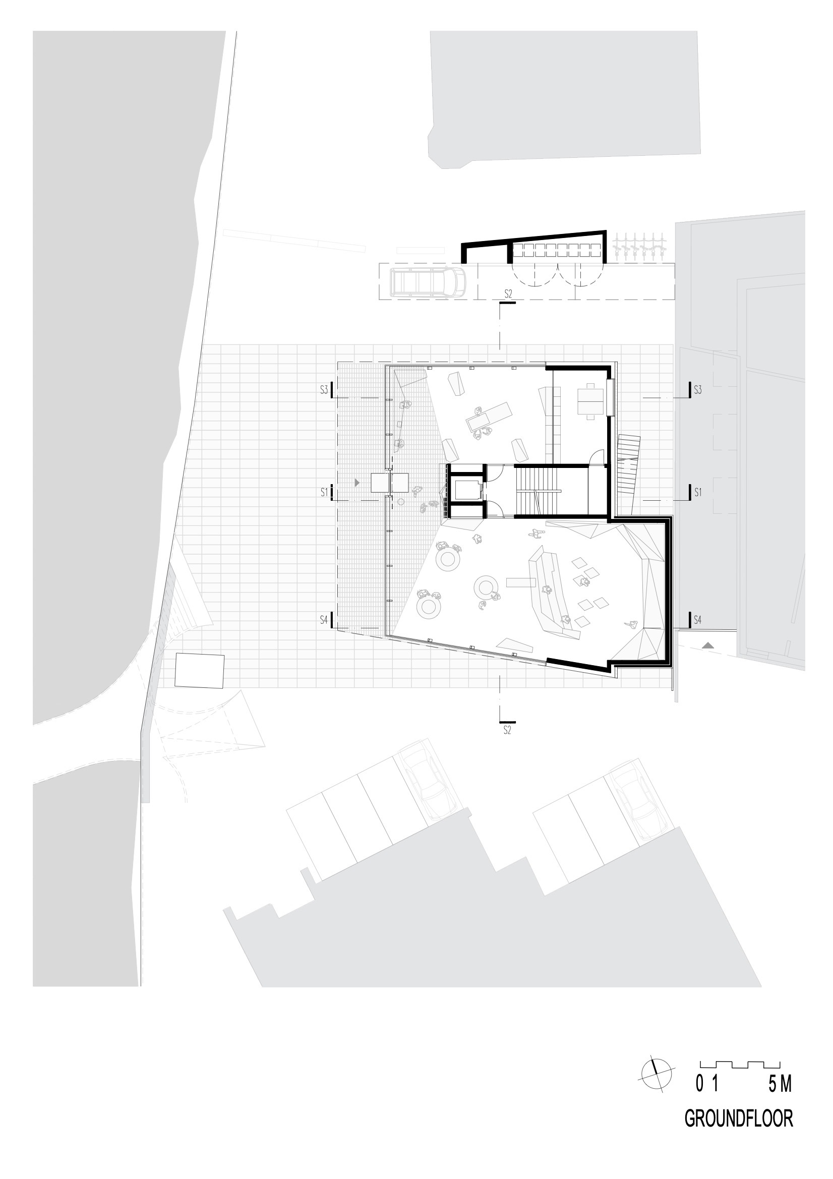 Ground floor plan drawing showing interior layout with terrace, stairs, and adjacent parking area