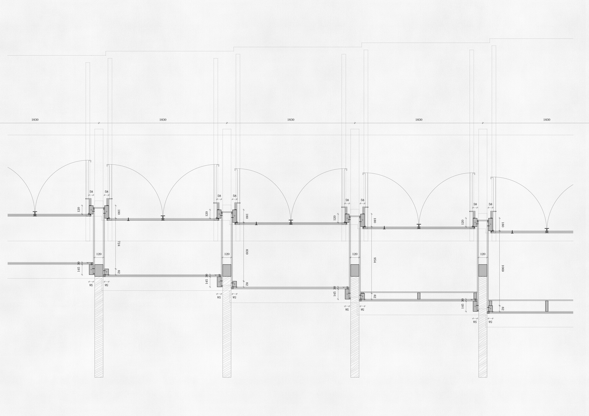 Detail drawing of the facade assembly showing glazing connections and arched openings