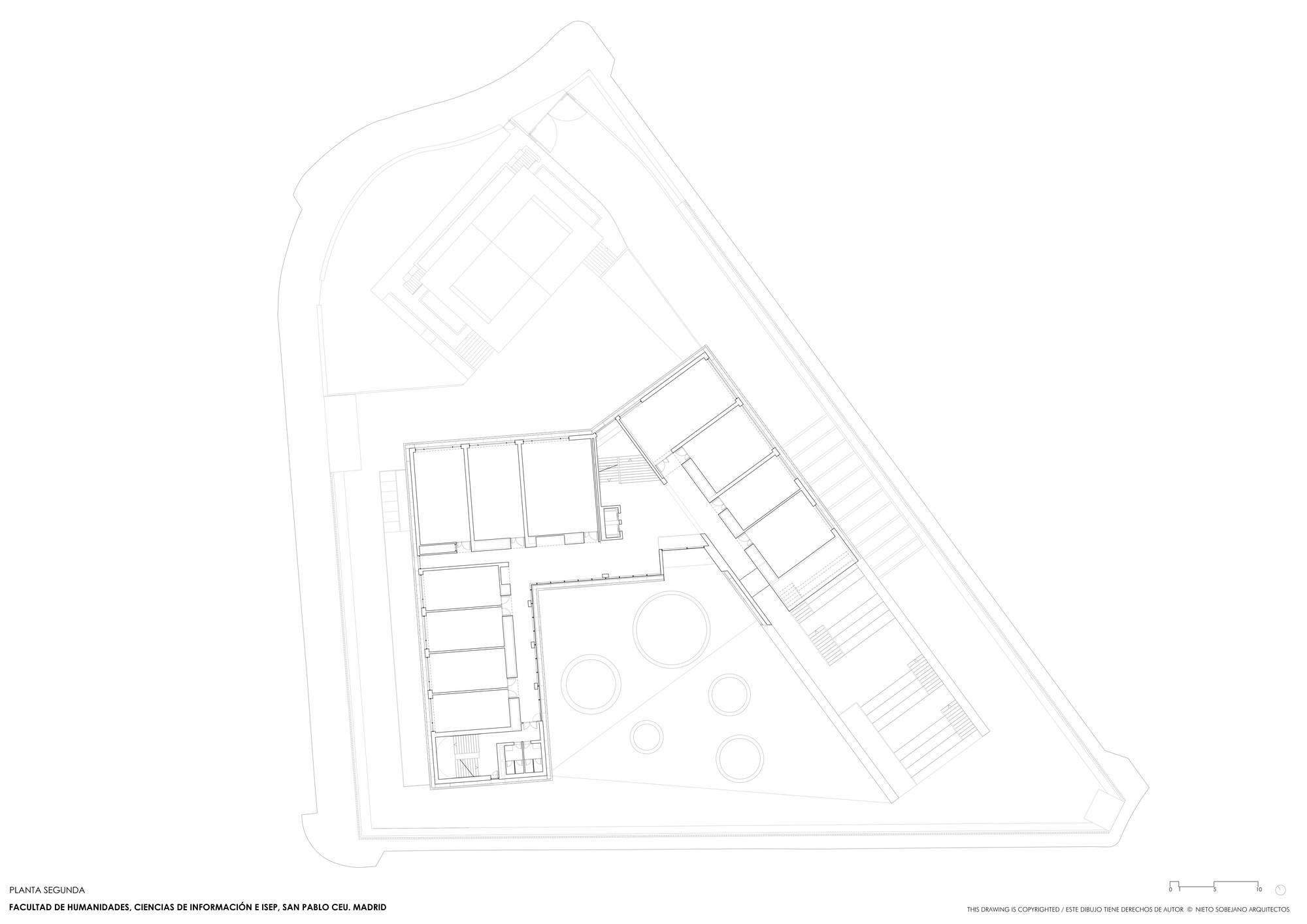 Second floor plan drawing showing circular elements in the central courtyard between two angled wings