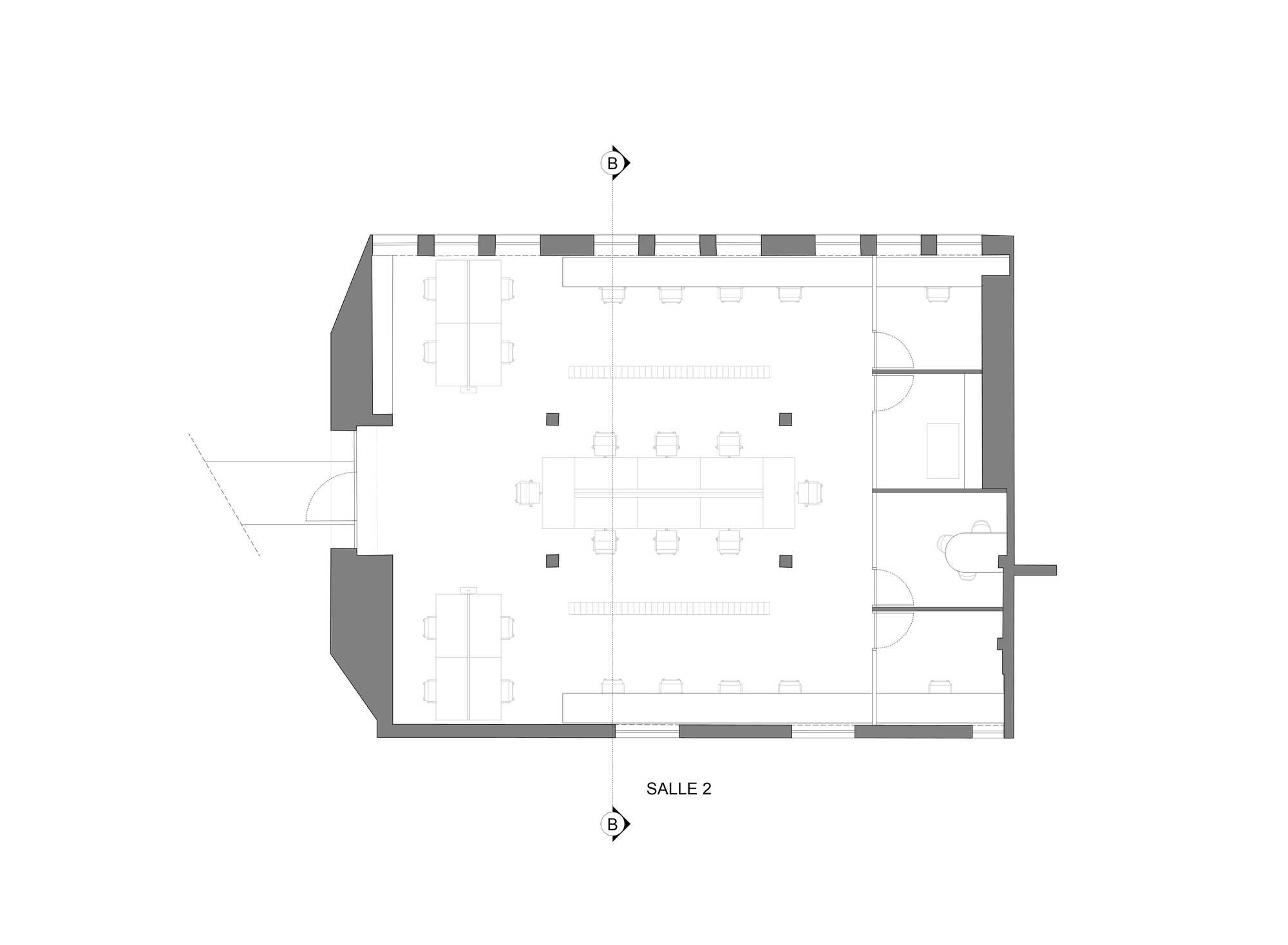Floor plan drawing depicting a rectangular workspace with central desking area and corner amenities