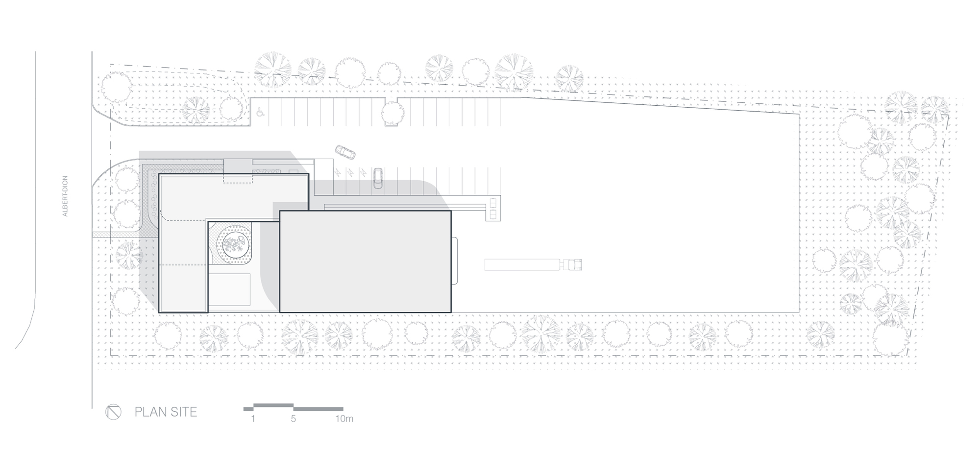 Site plan drawing showing two offset rectangular volumes surrounded by landscaping and tree placements