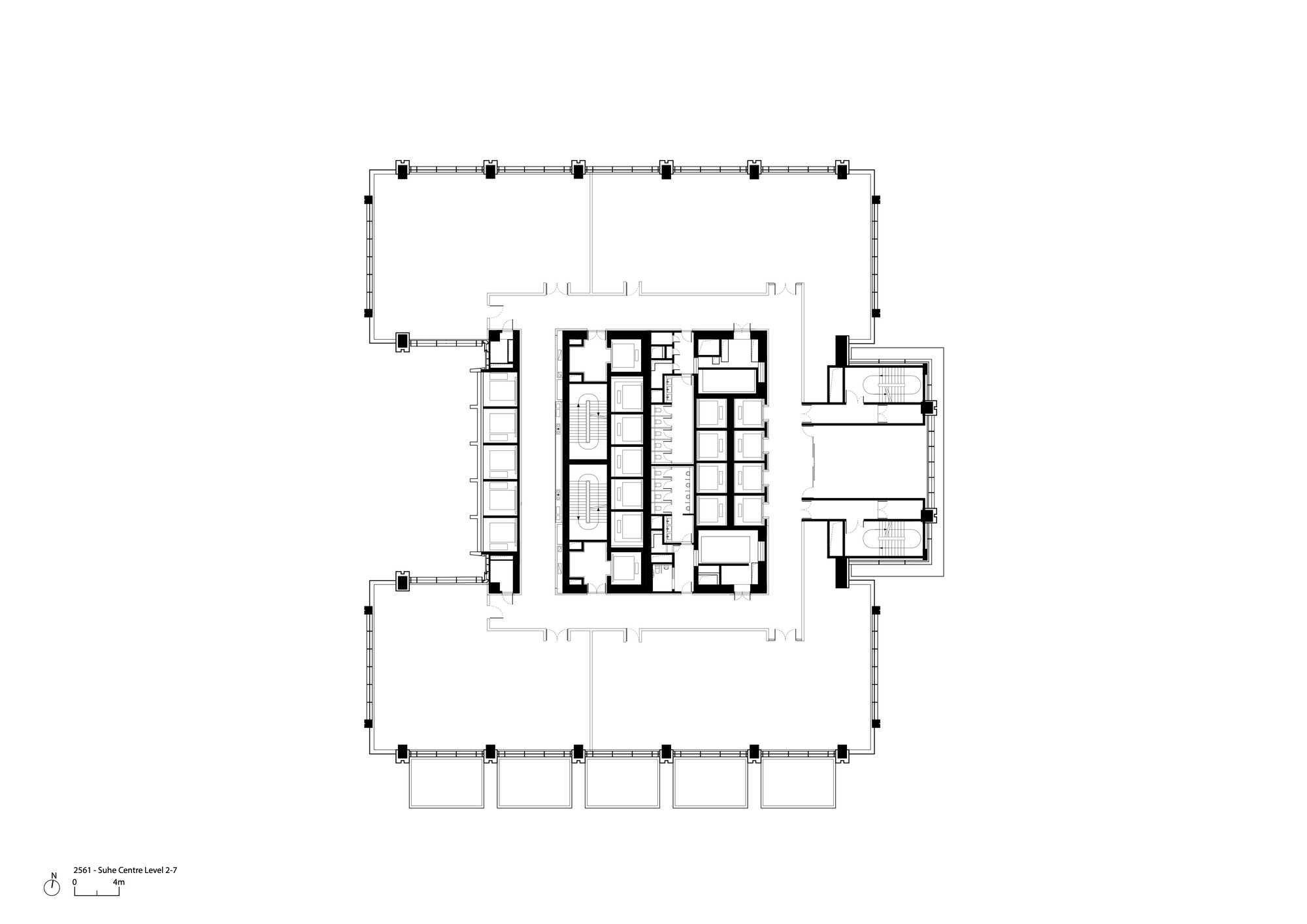 Upper floor plan drawing showing cellular layout with central service core and corner projections