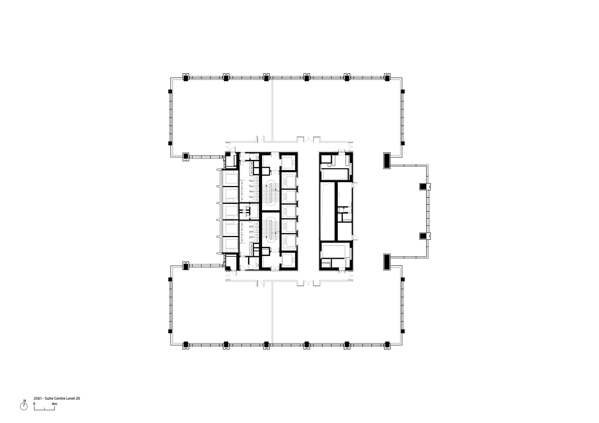 Floor plan showing central service core with vertical circulation and adjacent rooms within a column grid