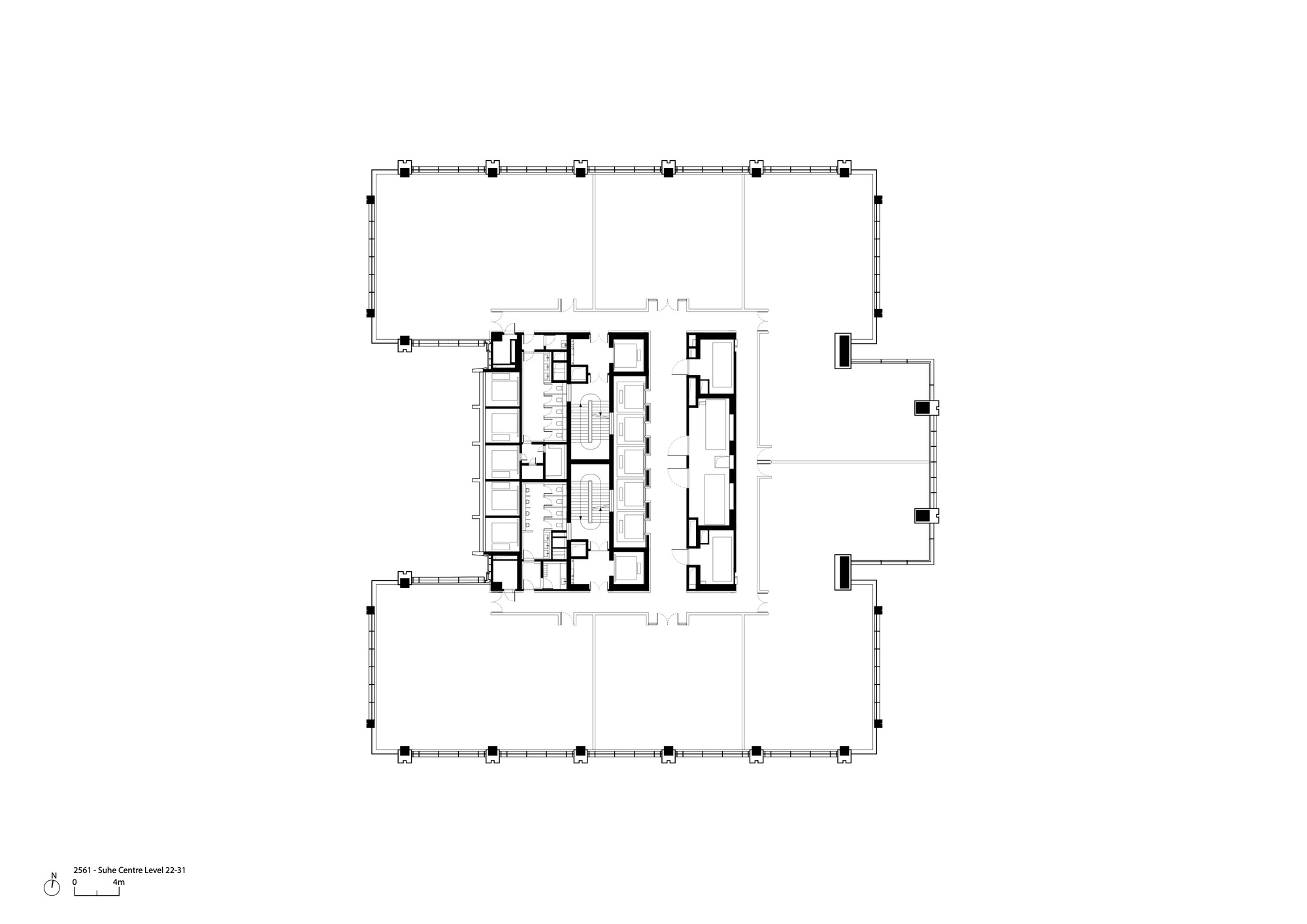 Floor plan showing central service core with stairwells and open floor area within column grid