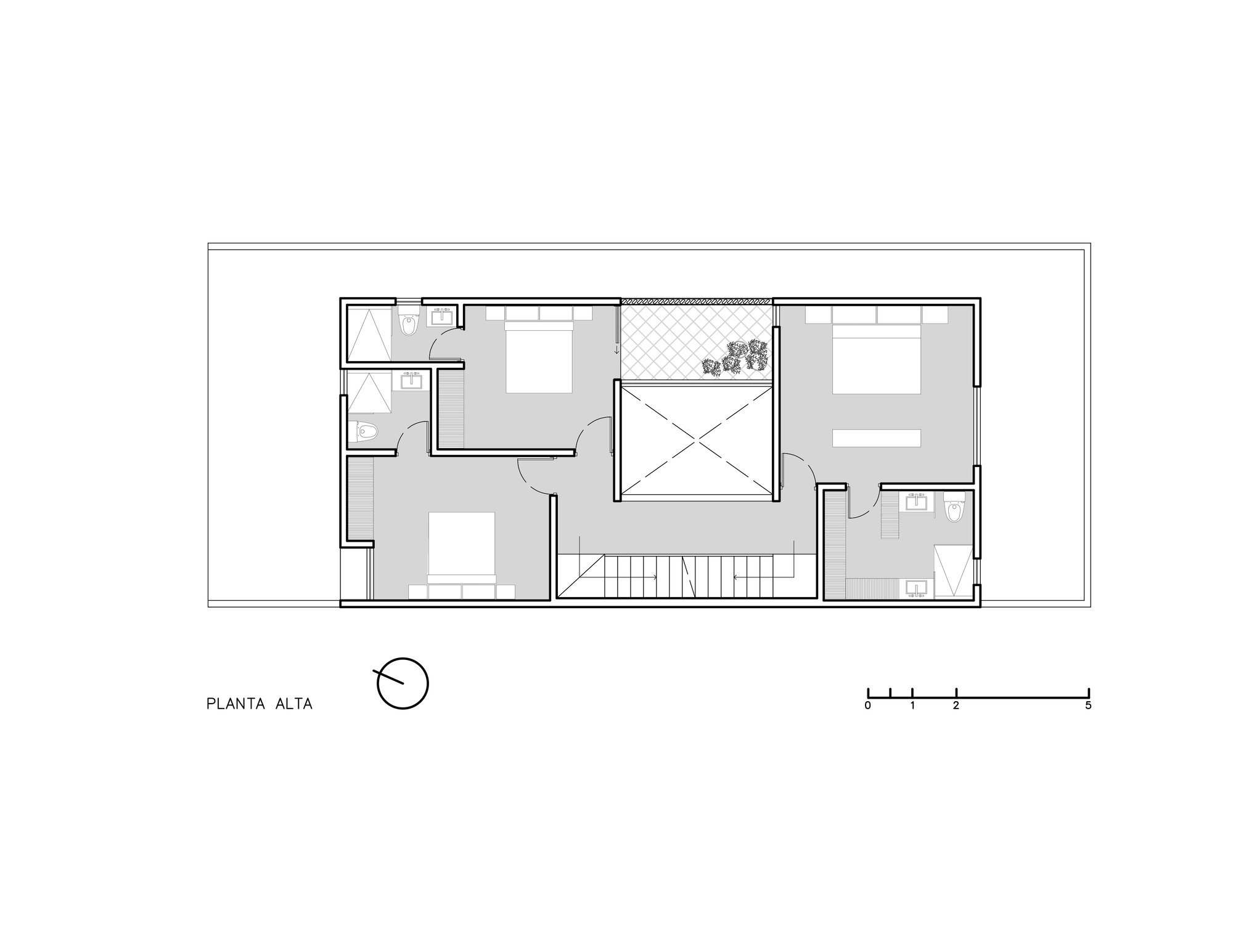 Upper floor plan with two bedrooms and a bathroom arranged around a central double-height void