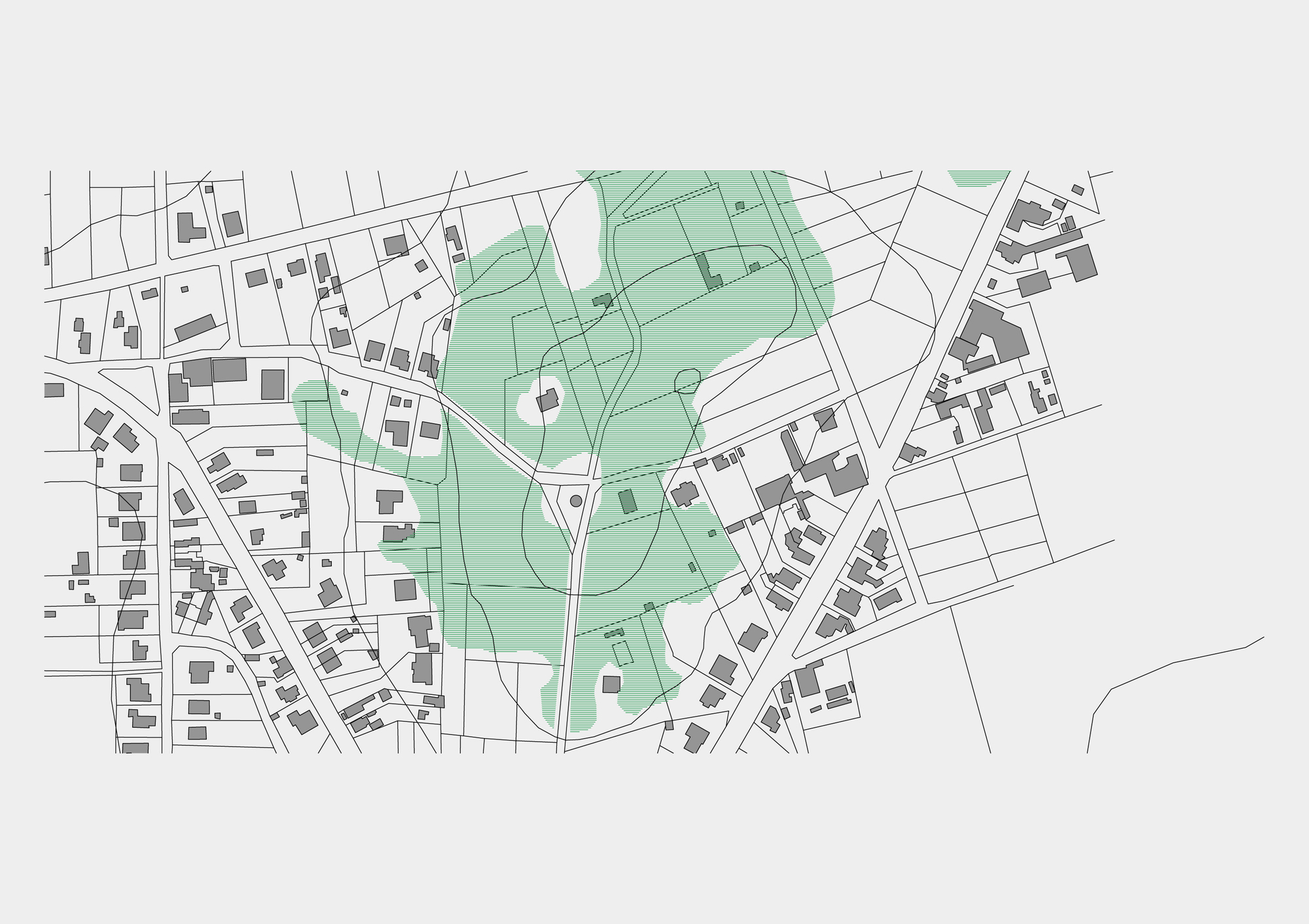 Site plan drawing with green-shaded areas showing parkland and pathways within an urban street grid