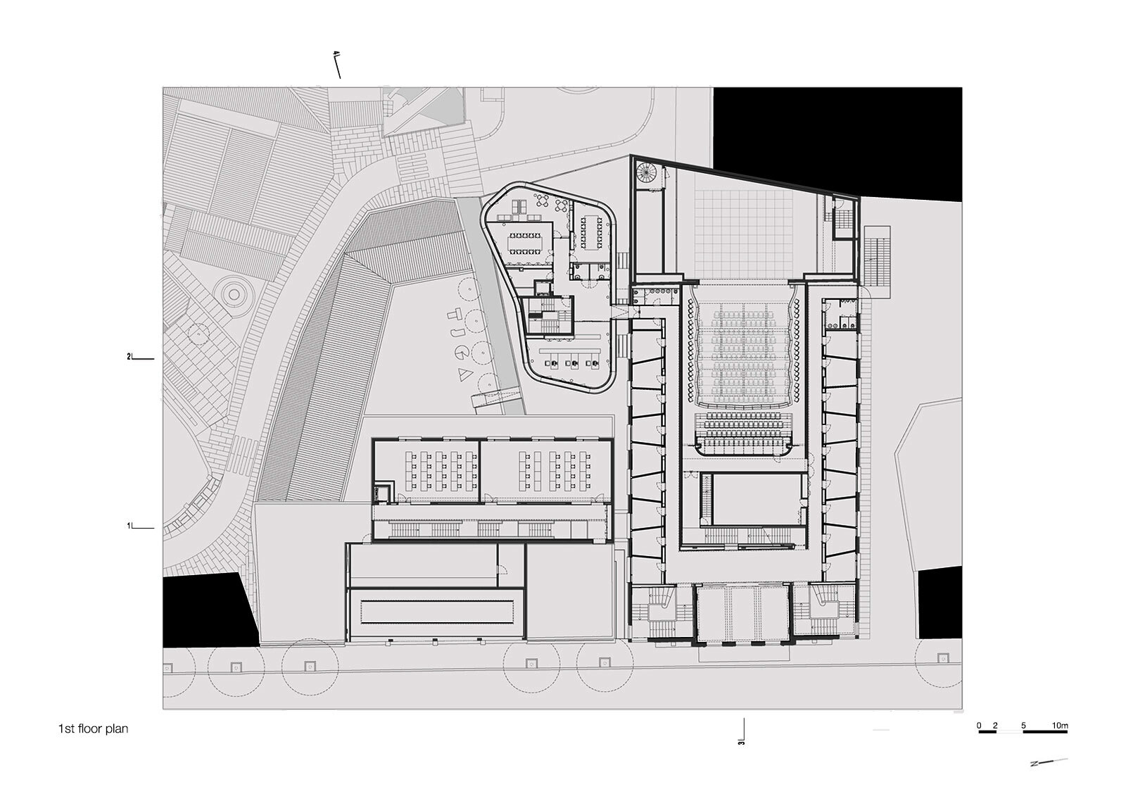 First floor plan drawing depicting upper level of auditorium with balcony seating and surrounding support spaces