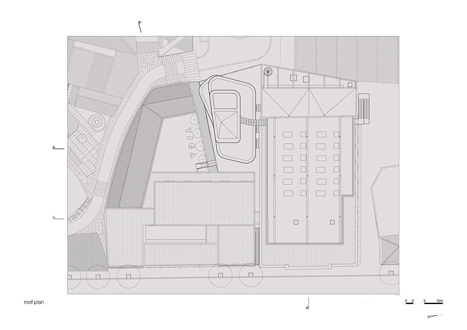 Roof plan drawing showing triangular skylight structure above main hall and organic-shaped courtyard pavilion roof