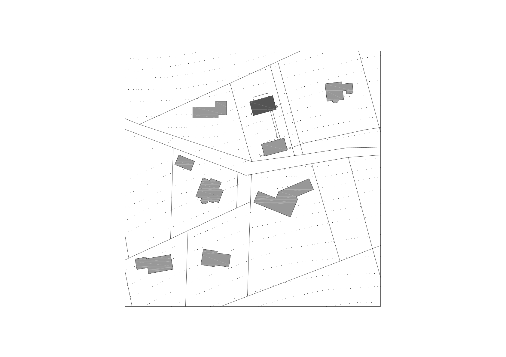 Site plan drawing showing building footprints and parcel boundaries along curved roadways