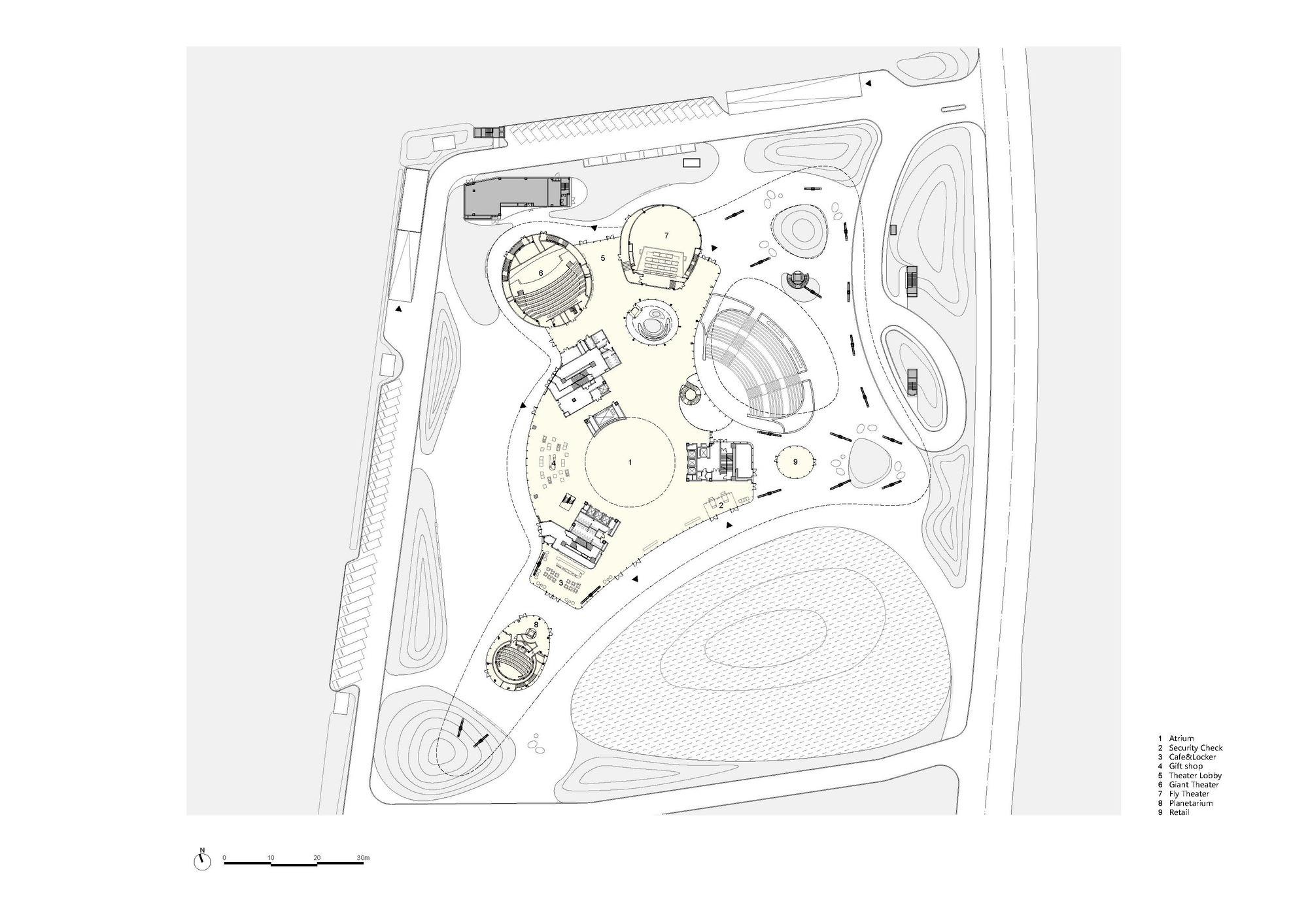 Site plan drawing showing circular and oval building volumes arranged within a landscaped perimeter