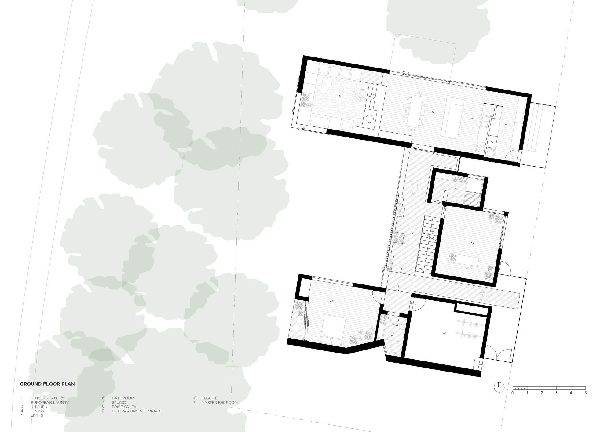 Ground floor plan drawing showing rectangular volumes arranged around a central staircase