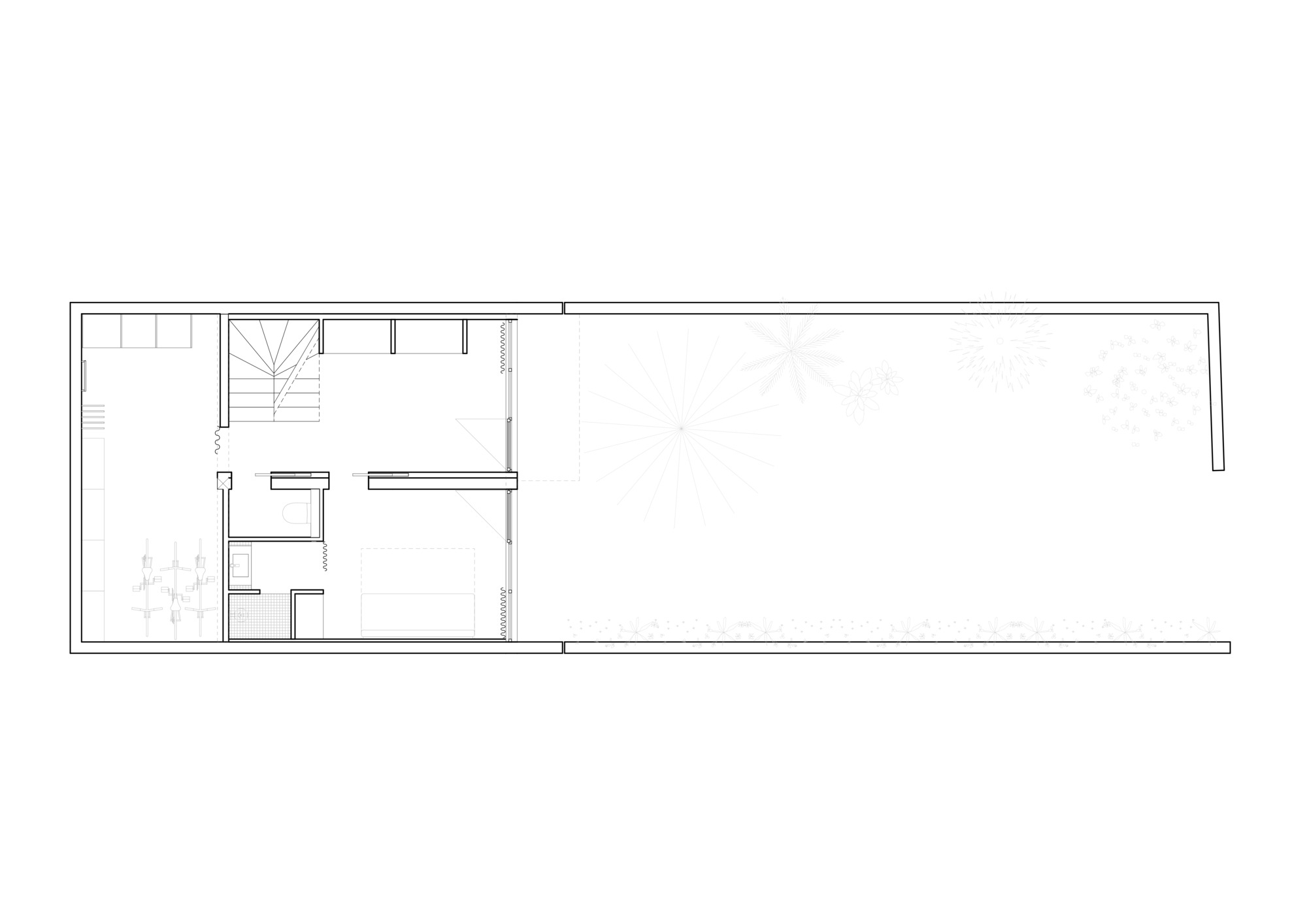 Floor plan drawing showing a long narrow volume with stair and service rooms clustered at one end