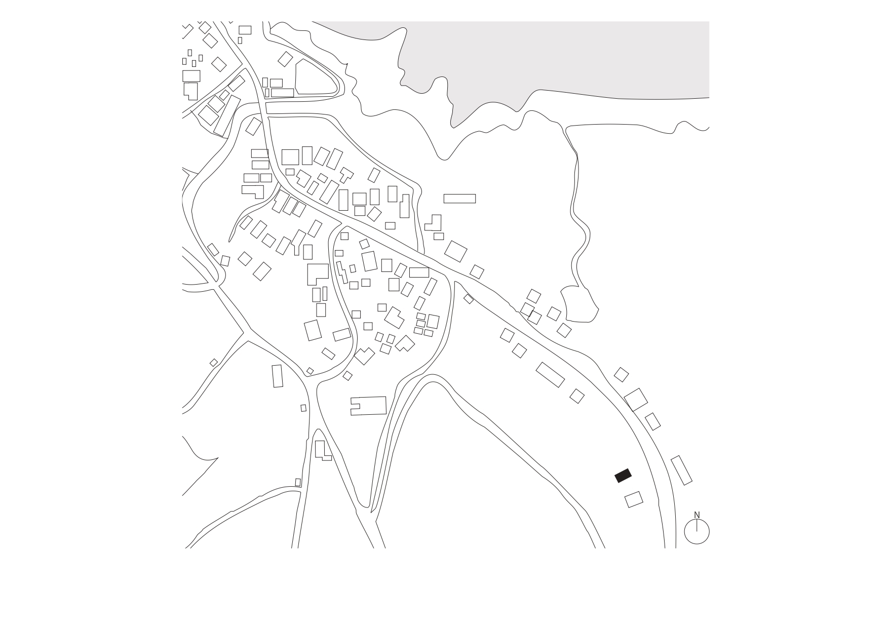 Site plan drawing showing a residential cluster along a waterfront with roads and building footprints