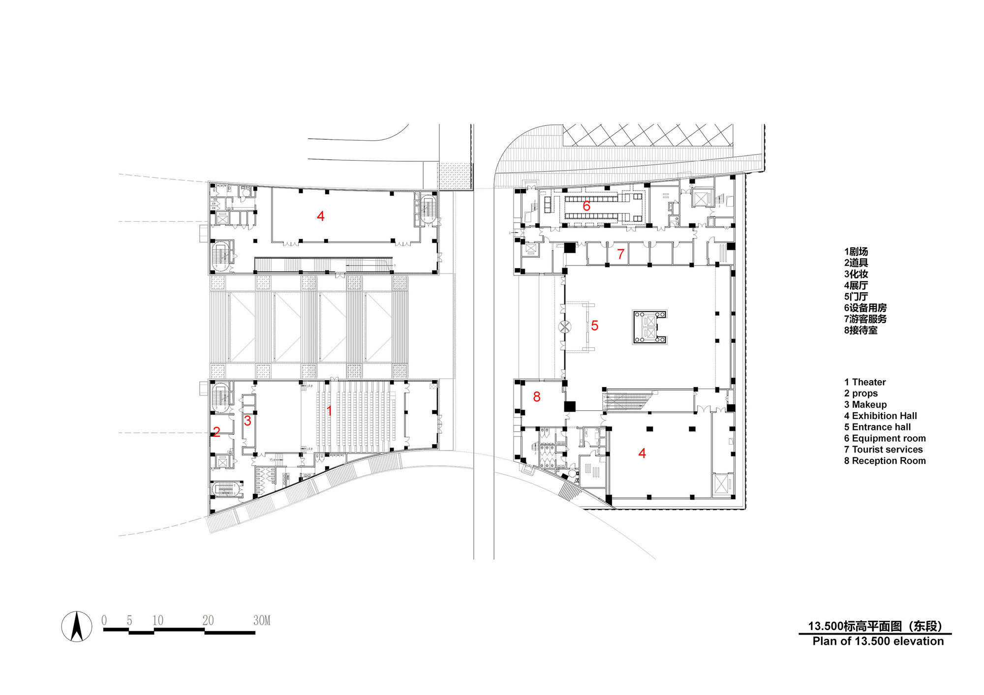 Floor plan drawing showing two interconnected buildings with labeled program spaces and a central courtyard
