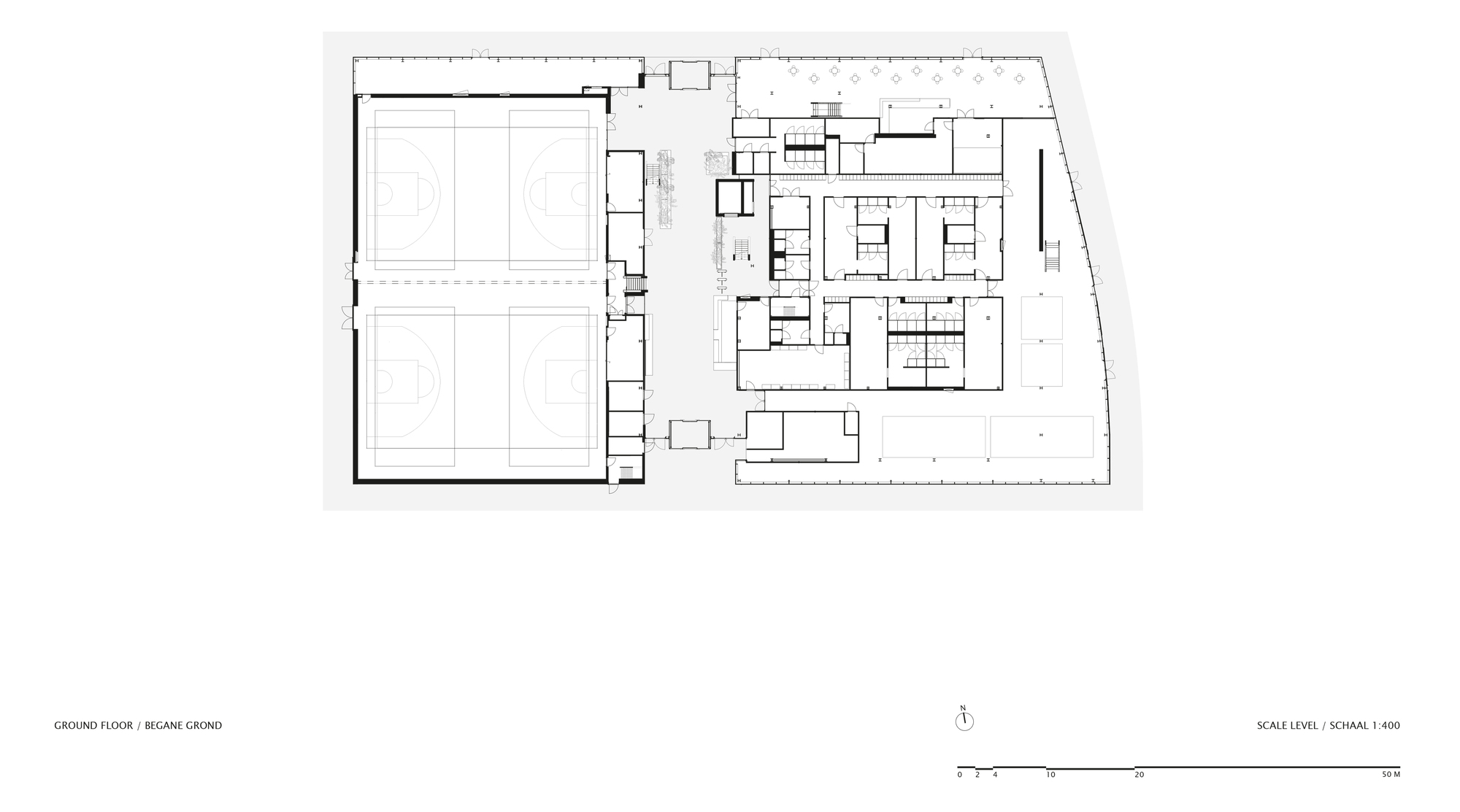 Ground floor plan drawing showing two sports courts and adjacent support spaces