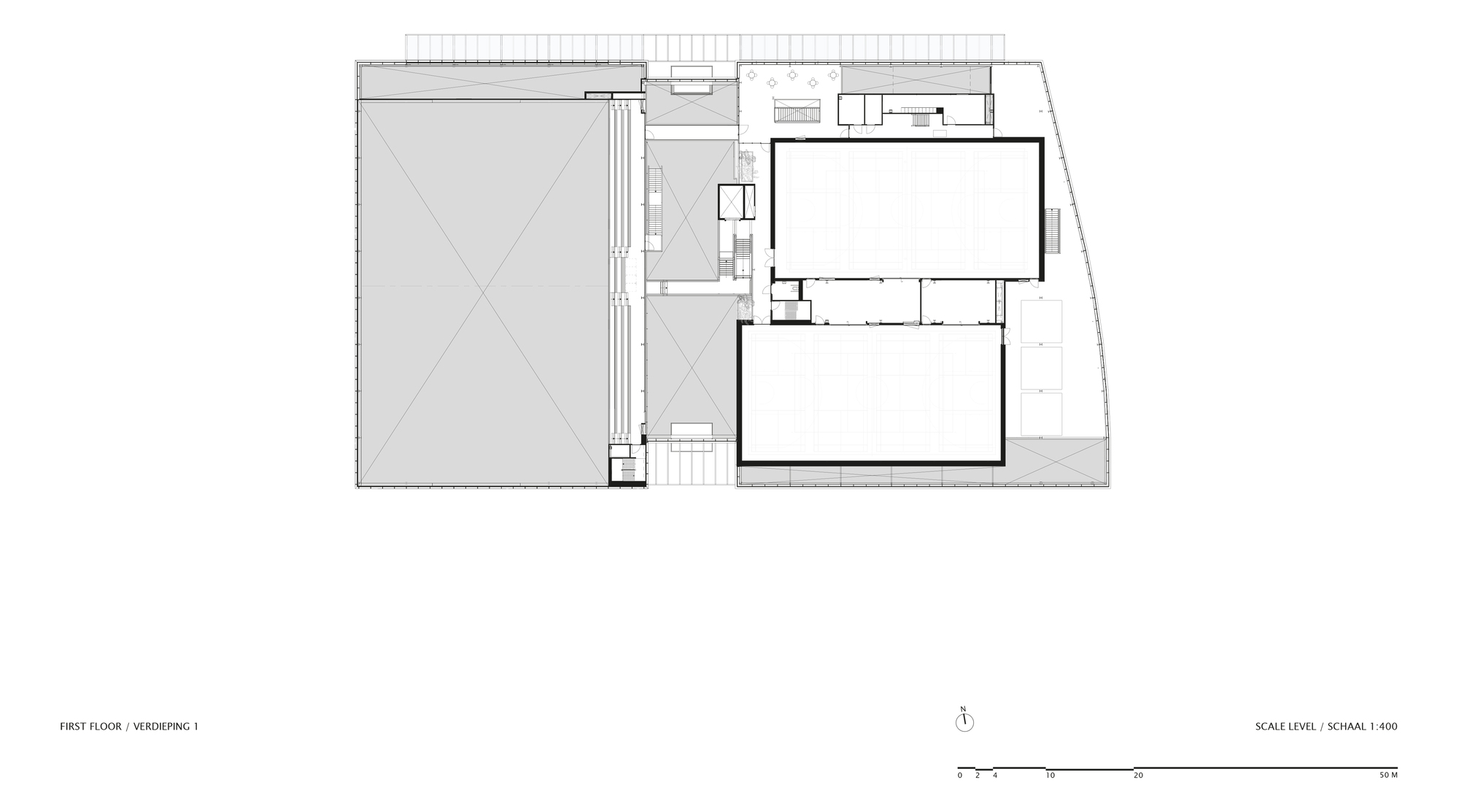 First floor plan drawing showing a large sports hall and smaller rectangular volume