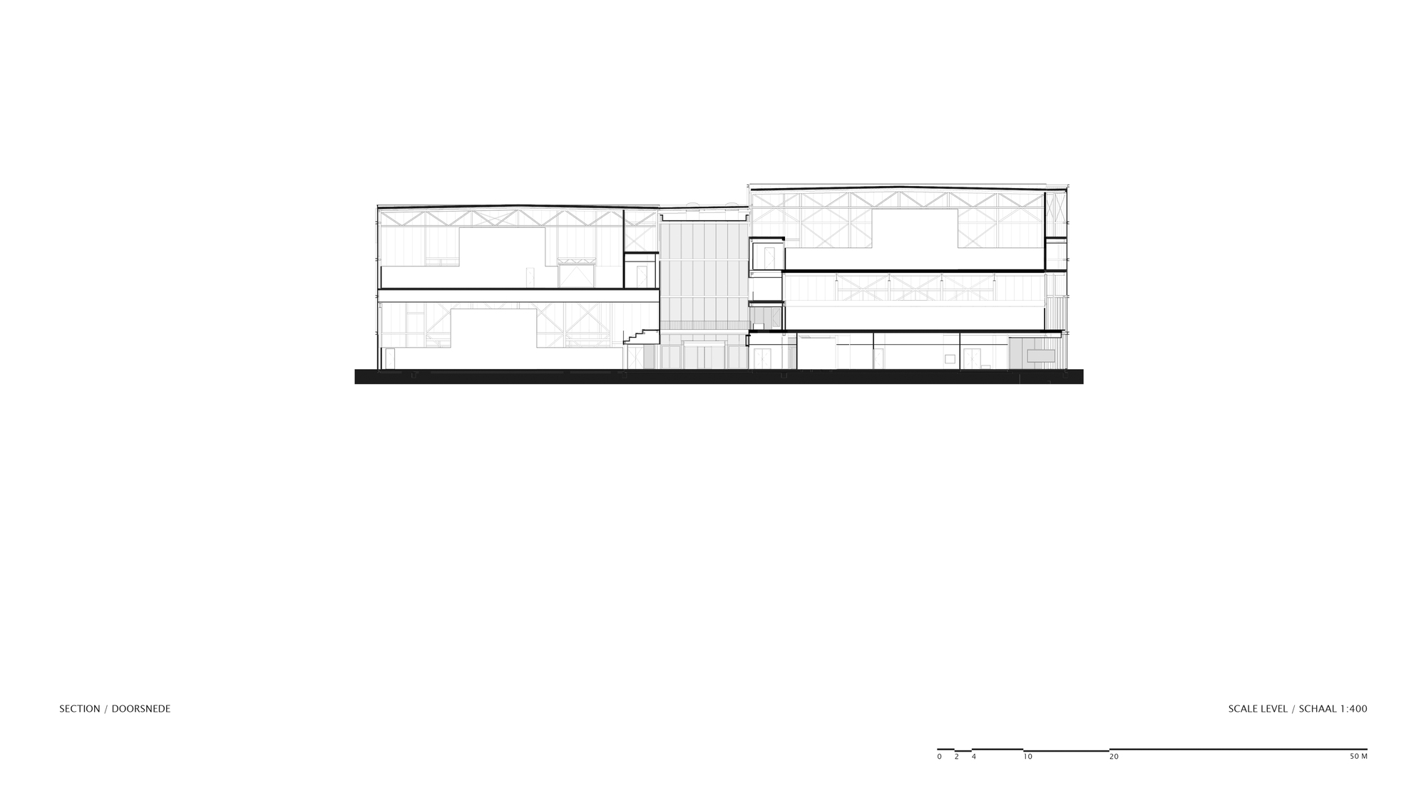 Section drawing through the doorway showing multi-level interior spaces with exposed ceiling trusses
